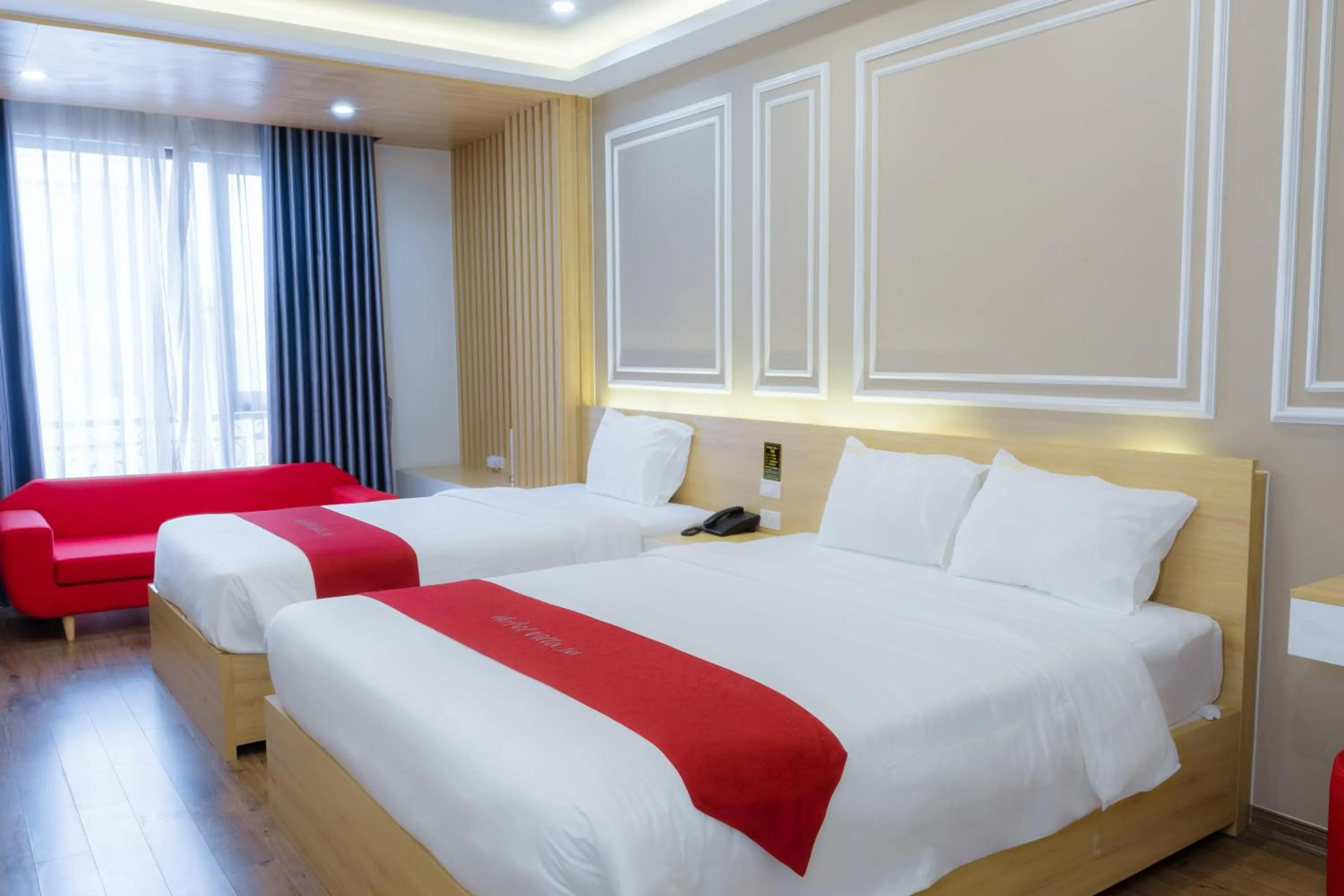 Seating area, Bed in Hotel Villa Ju