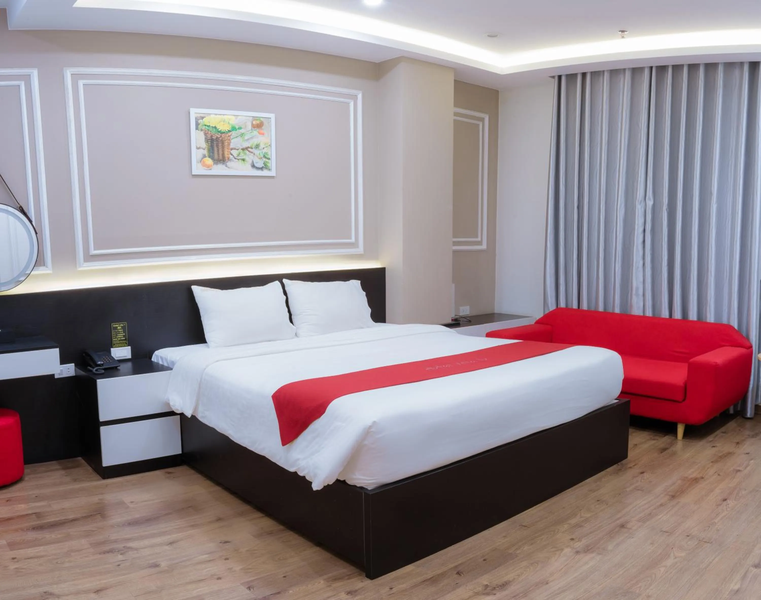 Seating area, Bed in Hotel Villa Ju