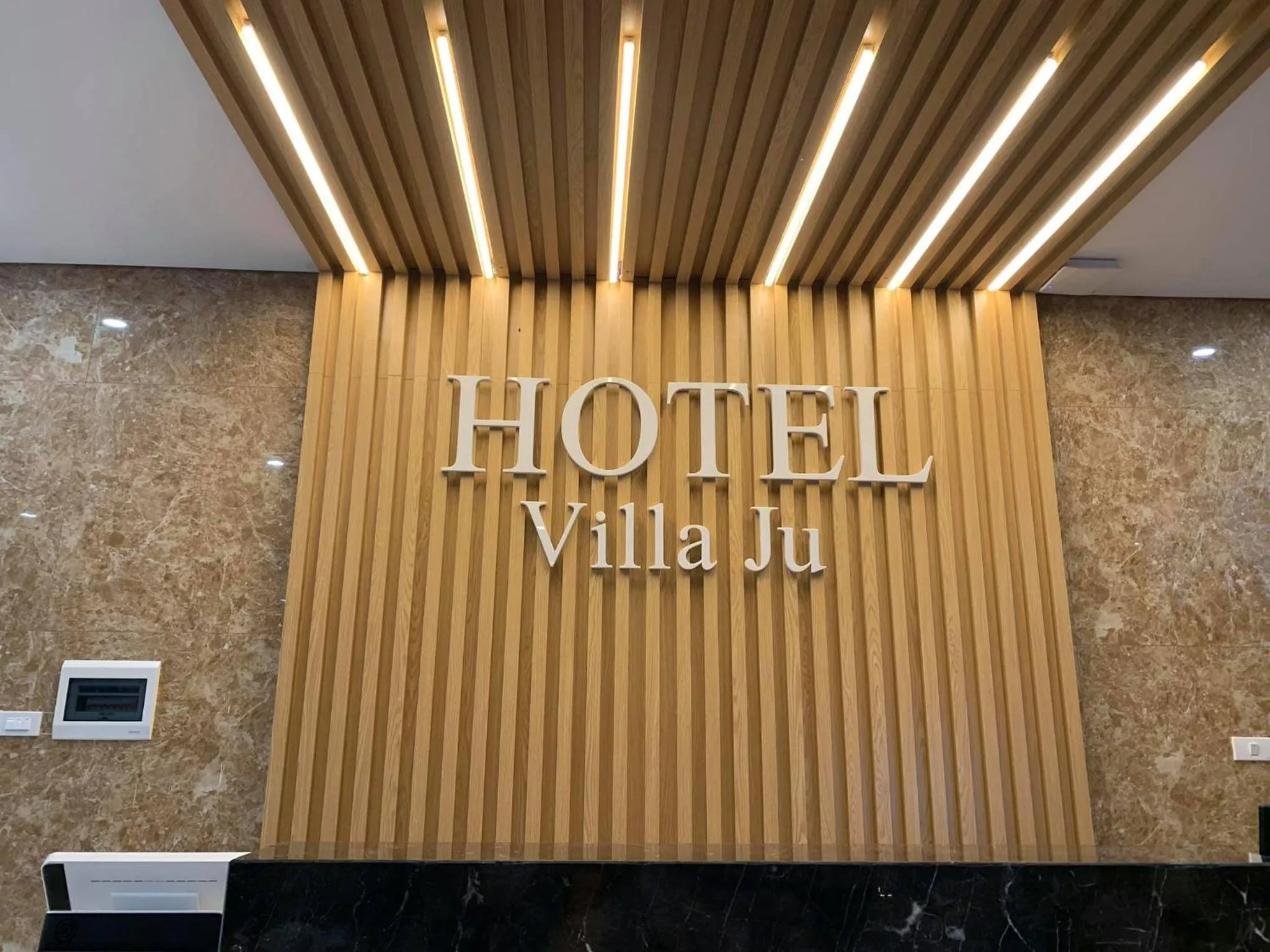 Property logo or sign in Hotel Villa Ju