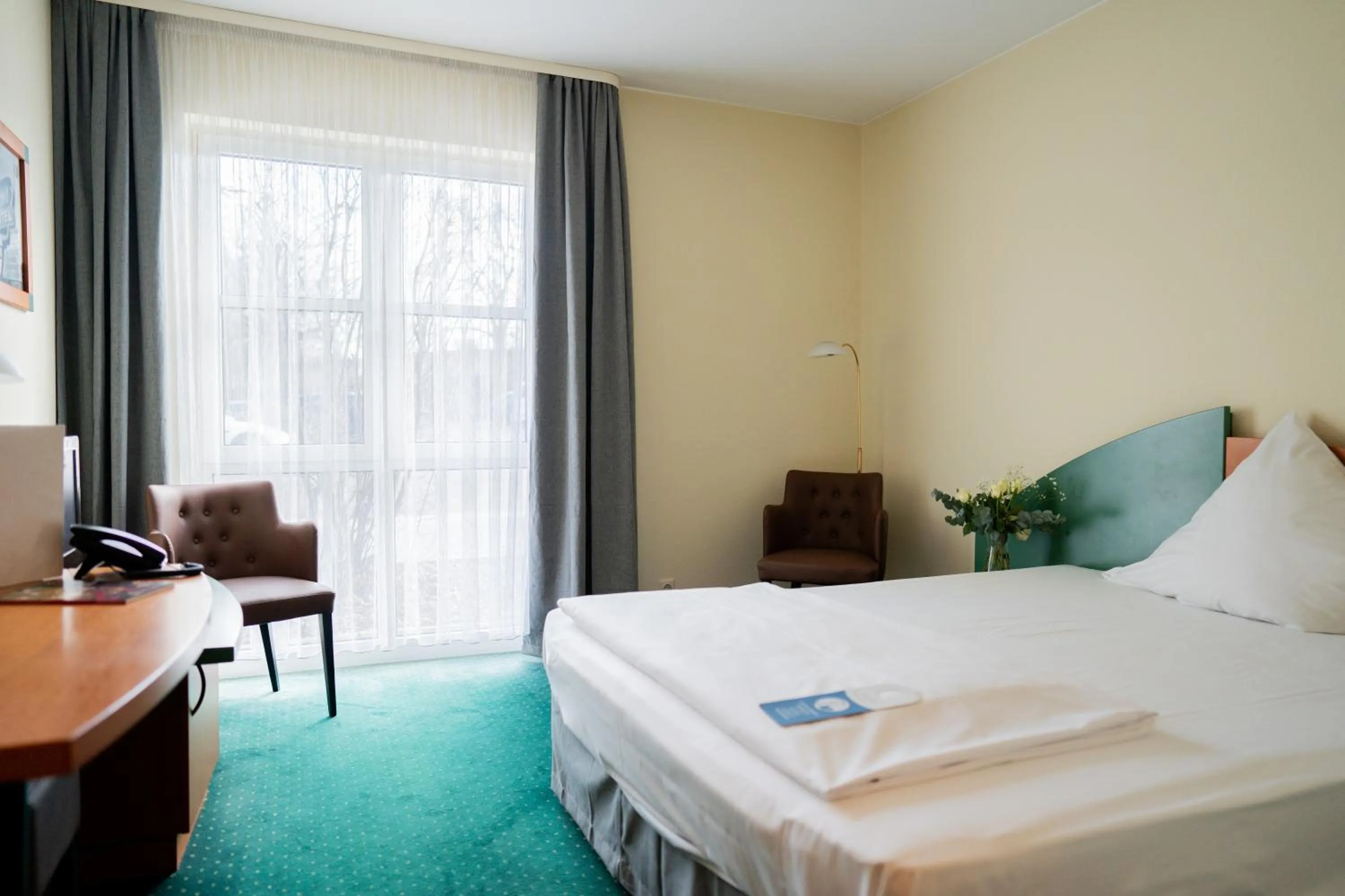 Photo of the whole room, Bed in Trip Inn Hotel Dasing-Augsburg