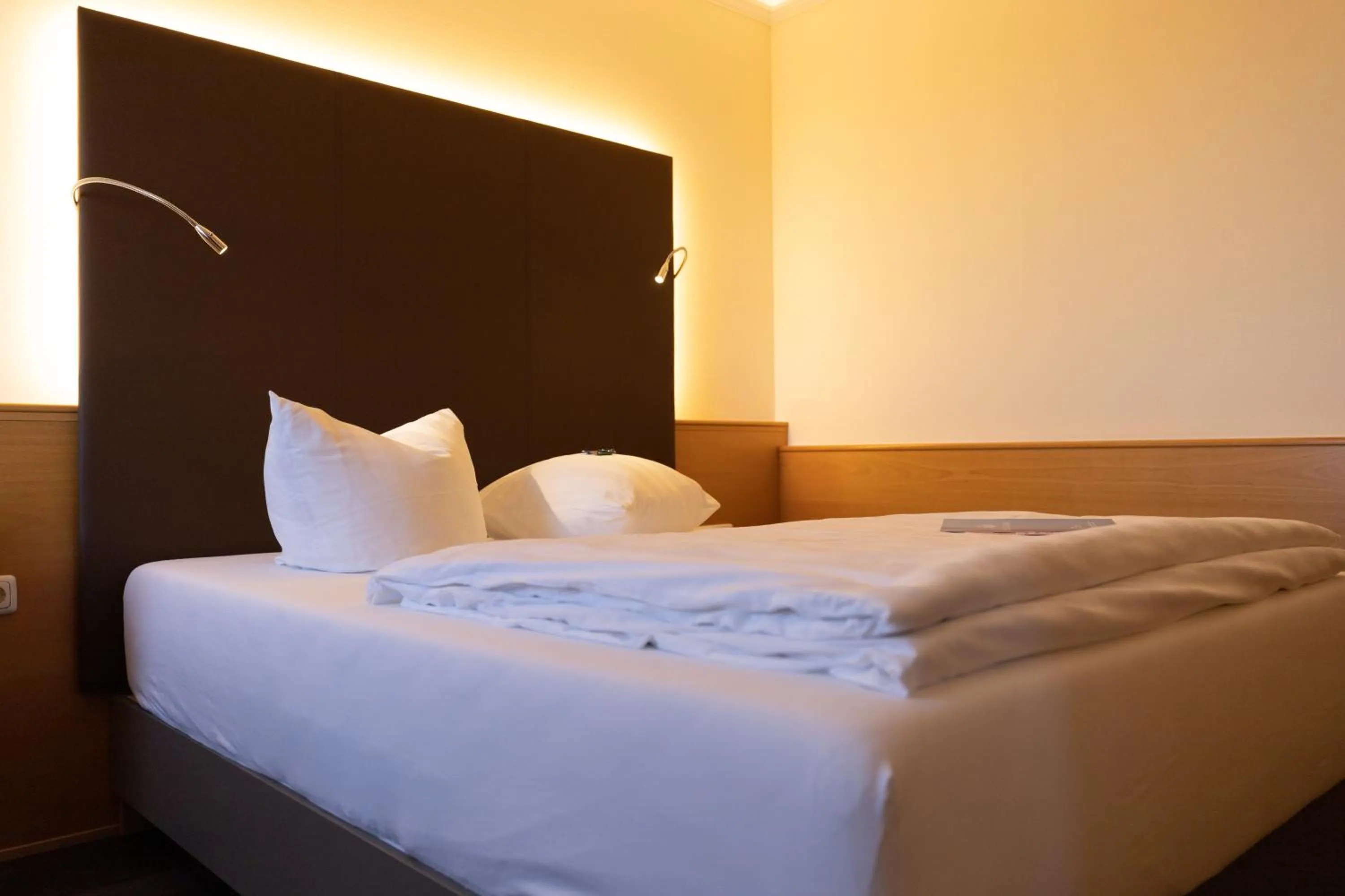 Living room, Bed in Hotel Bavaria Brehna