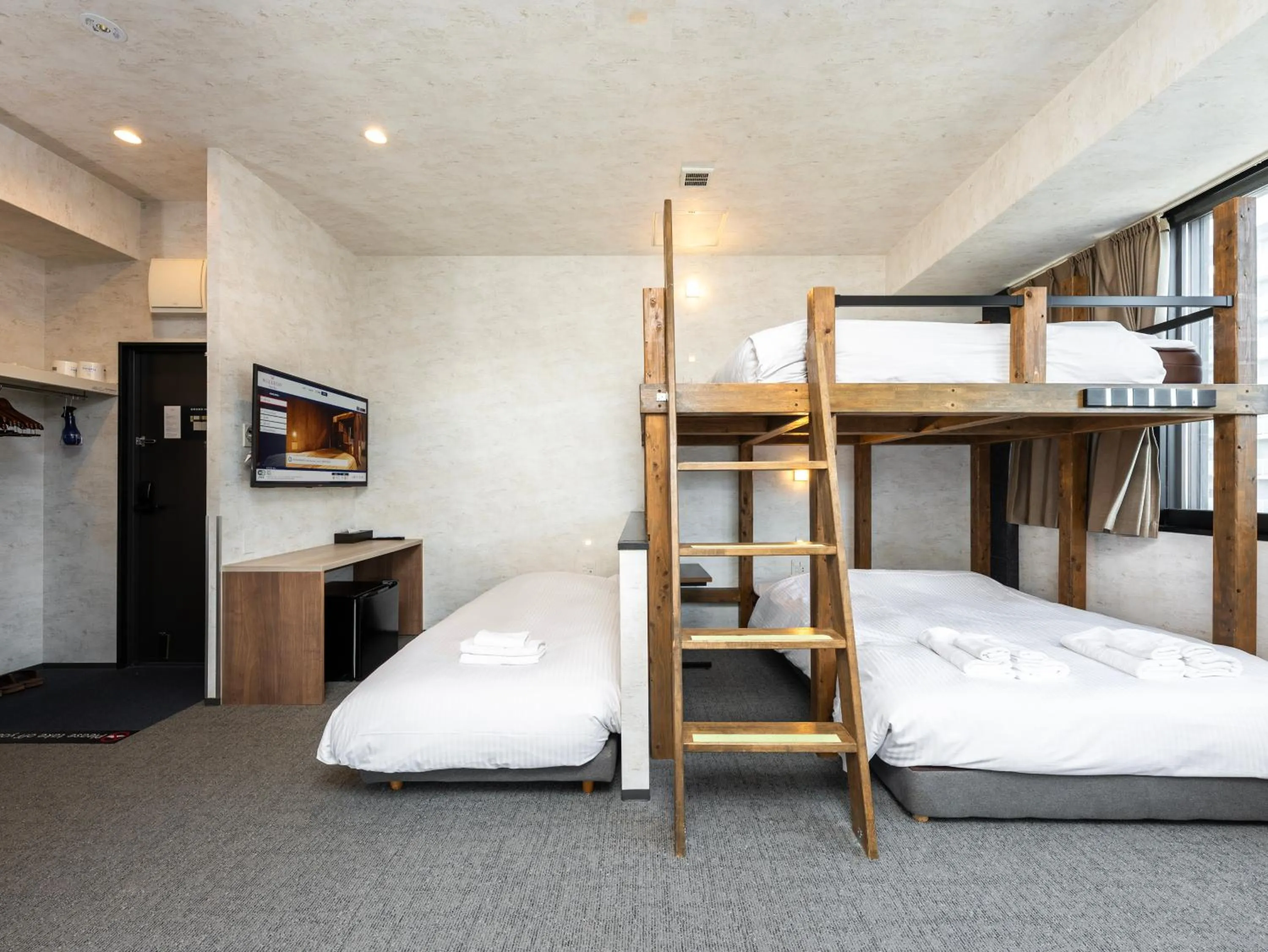 Bed in WELLSTAY Namba