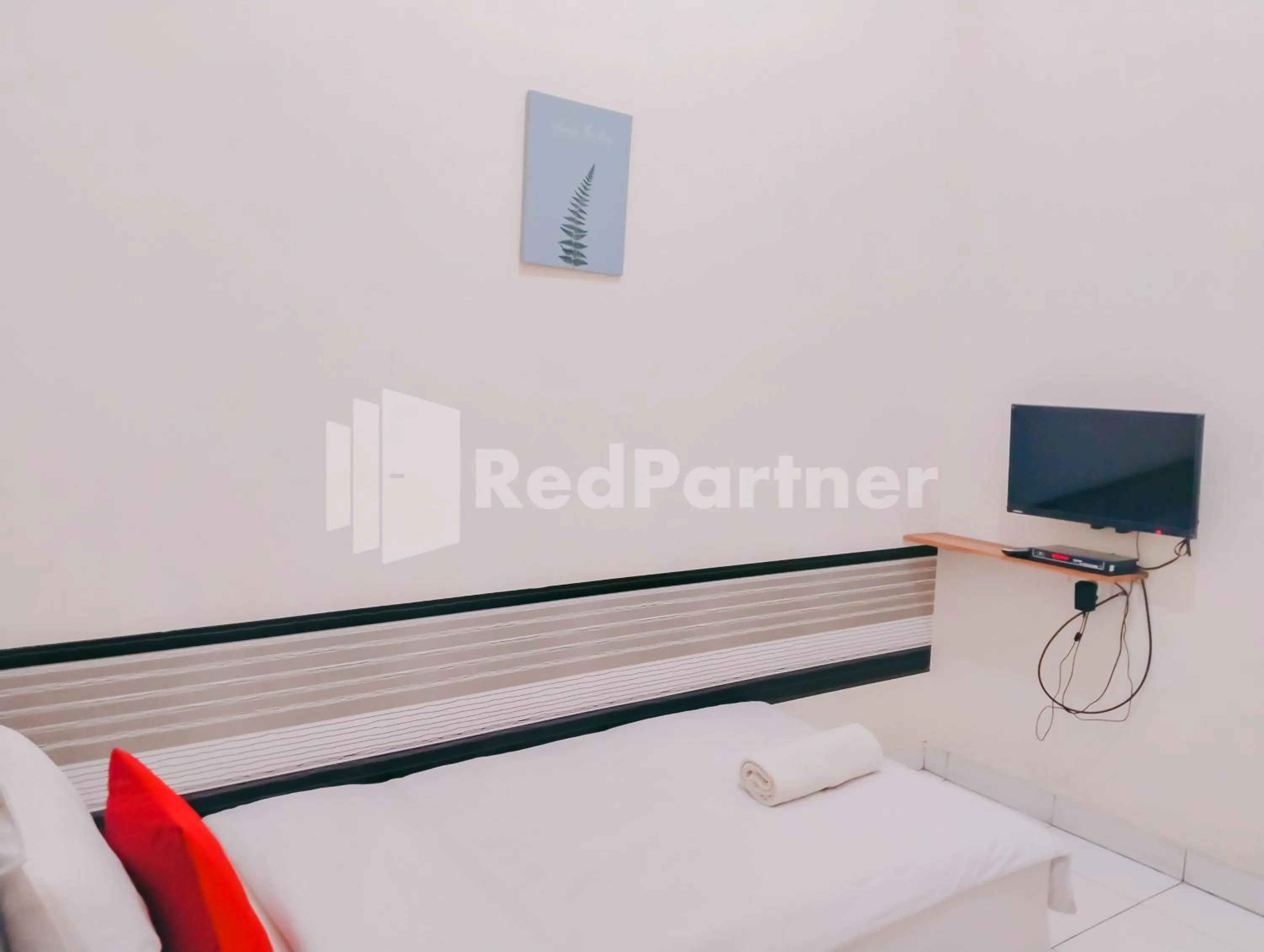 Bed in Siliwangi Guest House Syariah Tasikmalaya RedPartner