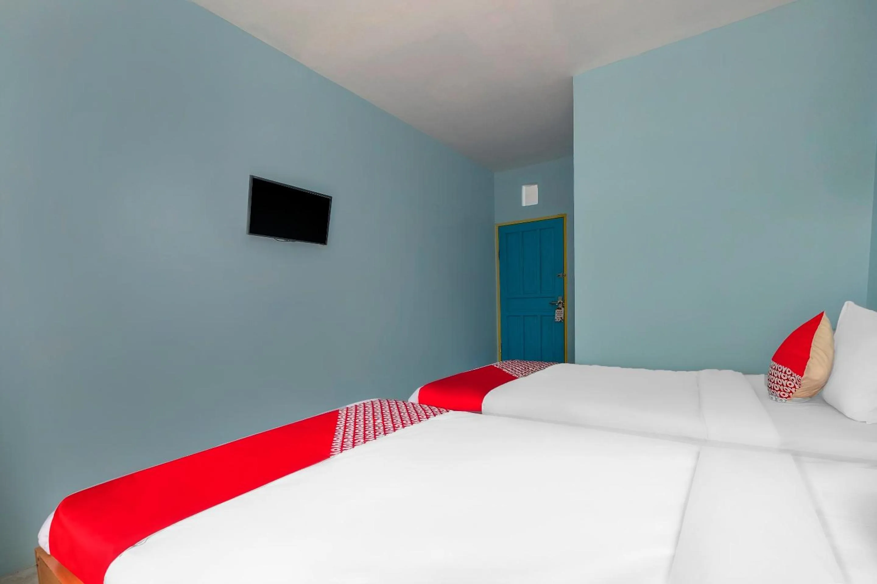 Bedroom, Bed in Hotel O RF Homestay