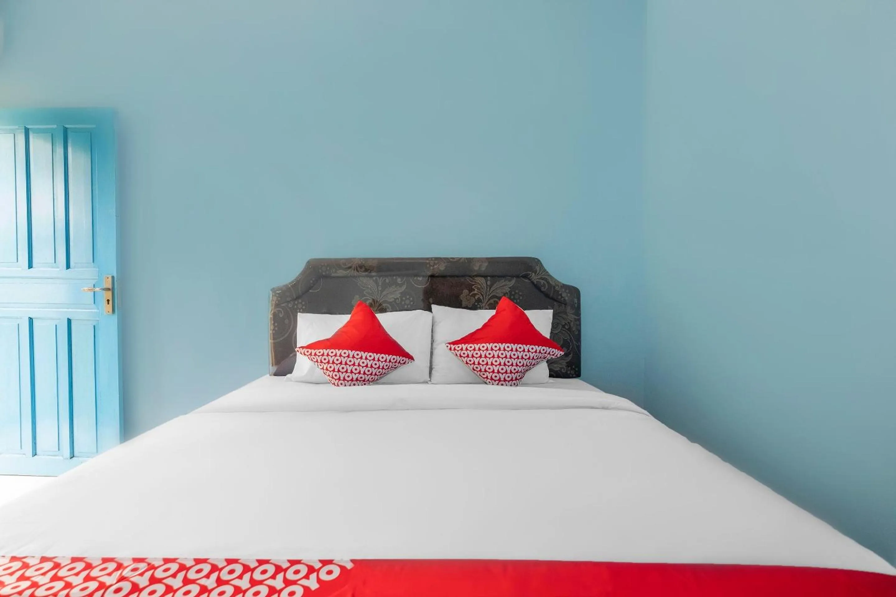 Bedroom, Bed in Hotel O RF Homestay