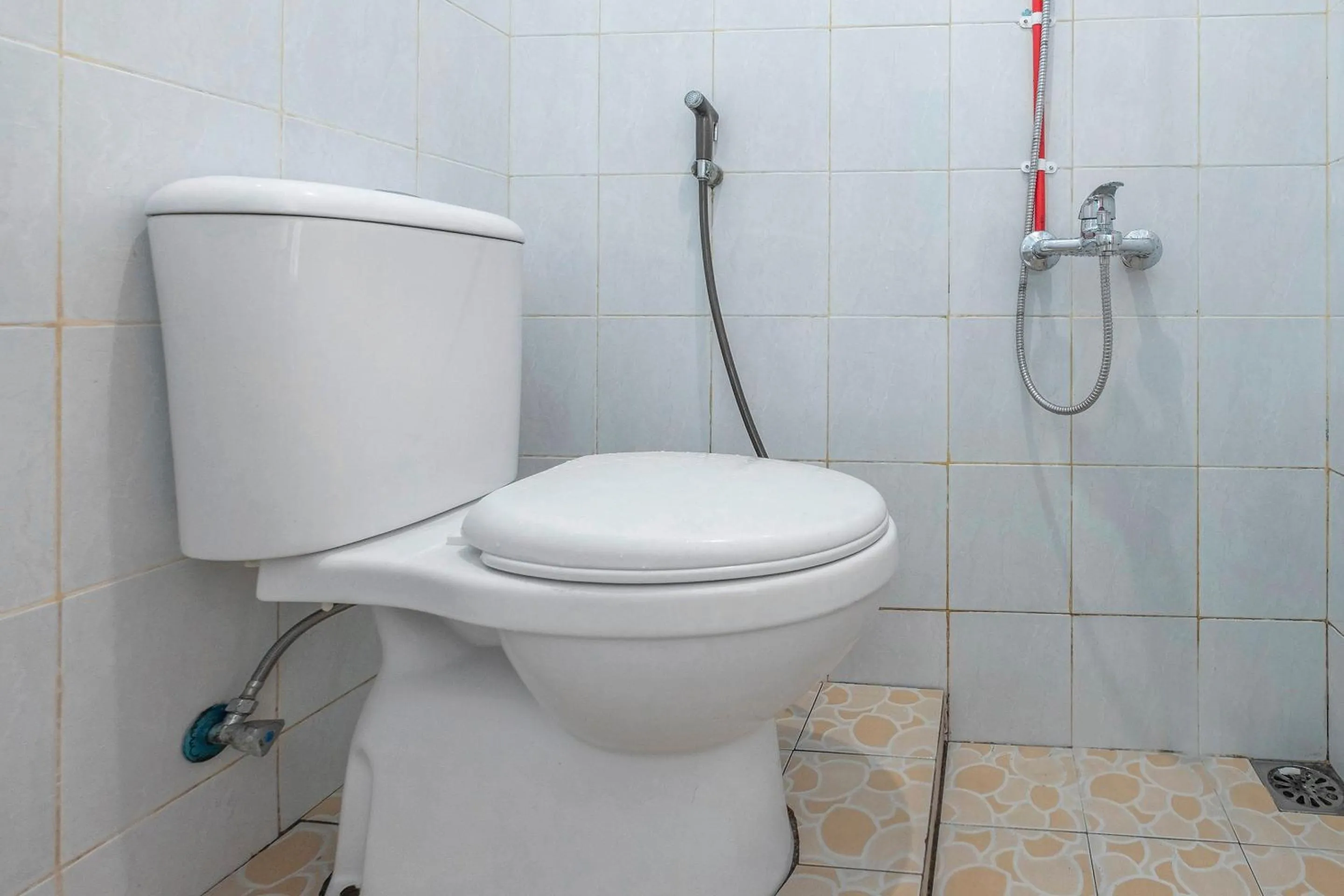 Bathroom in Hotel O RF Homestay