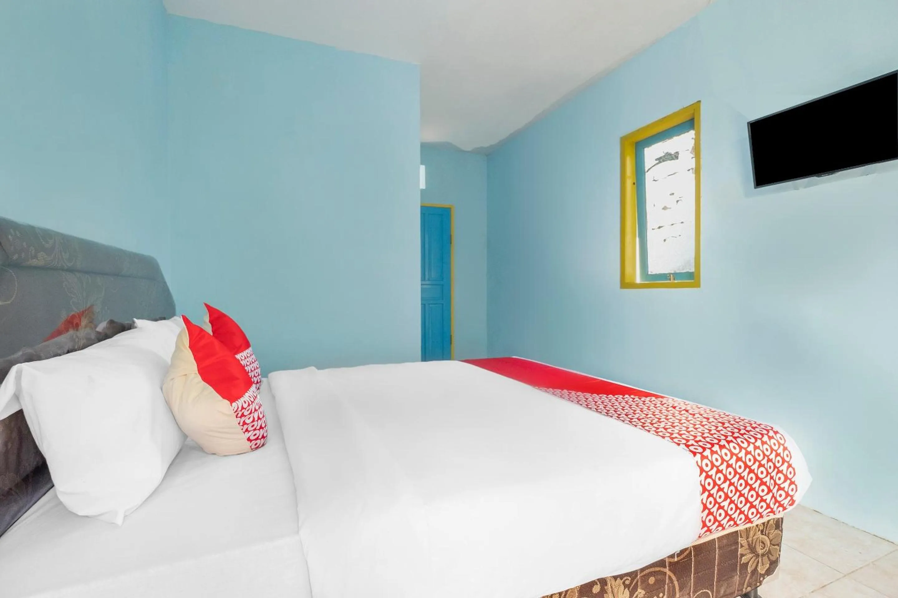 Bedroom, Bed in Hotel O RF Homestay