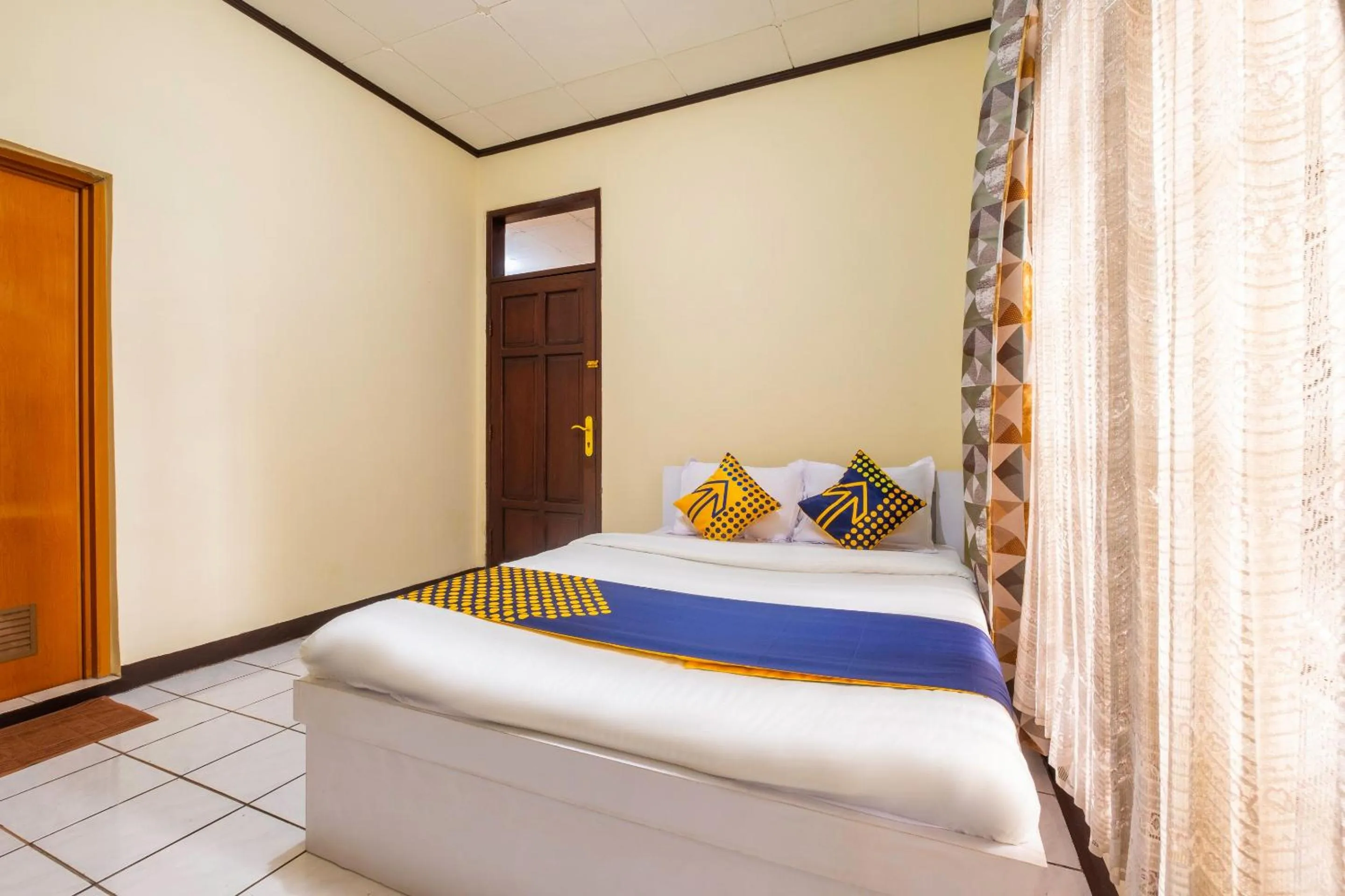 Bedroom in Super OYO 2672 Bee M Syariah