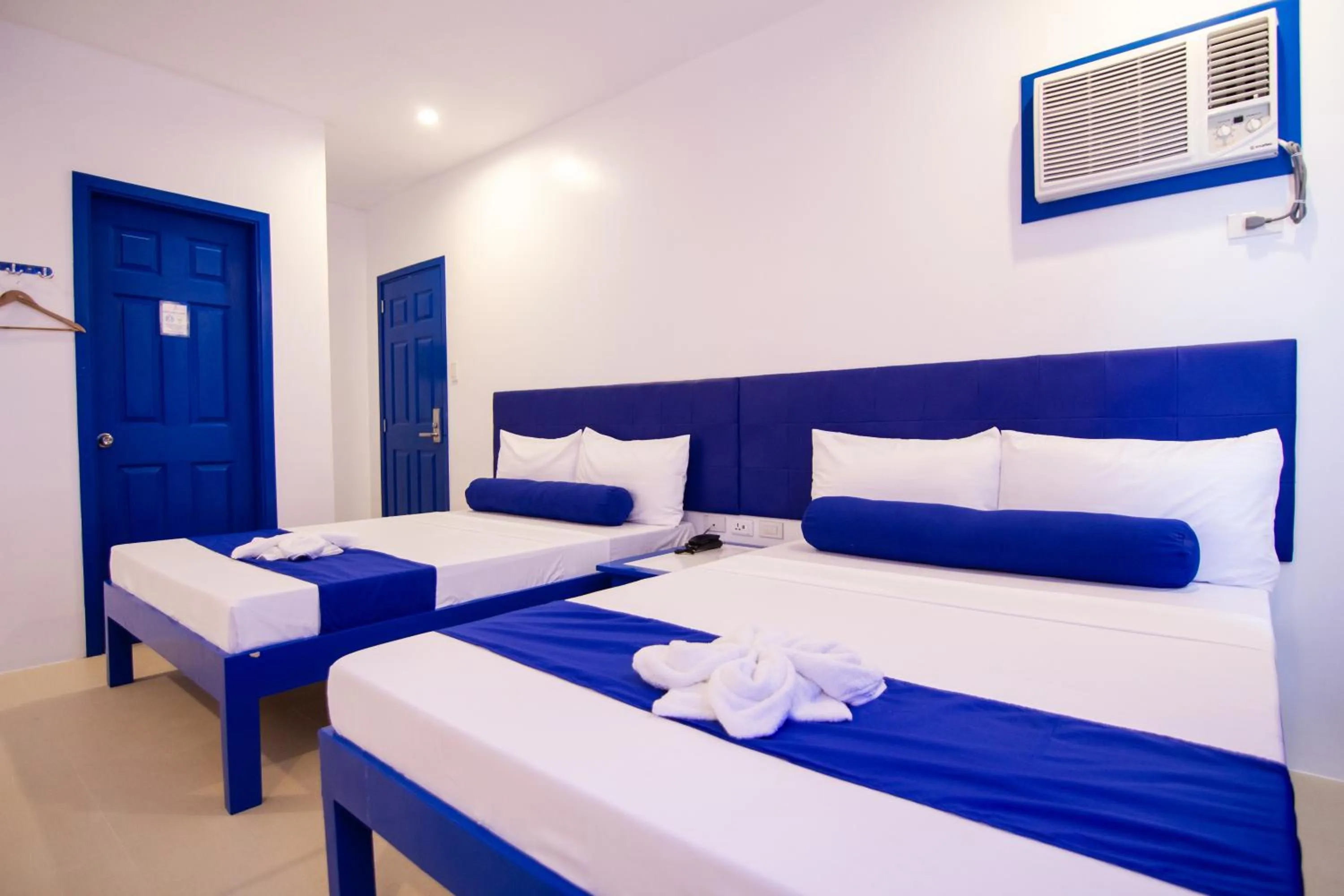 Bed in Skytel Palawan