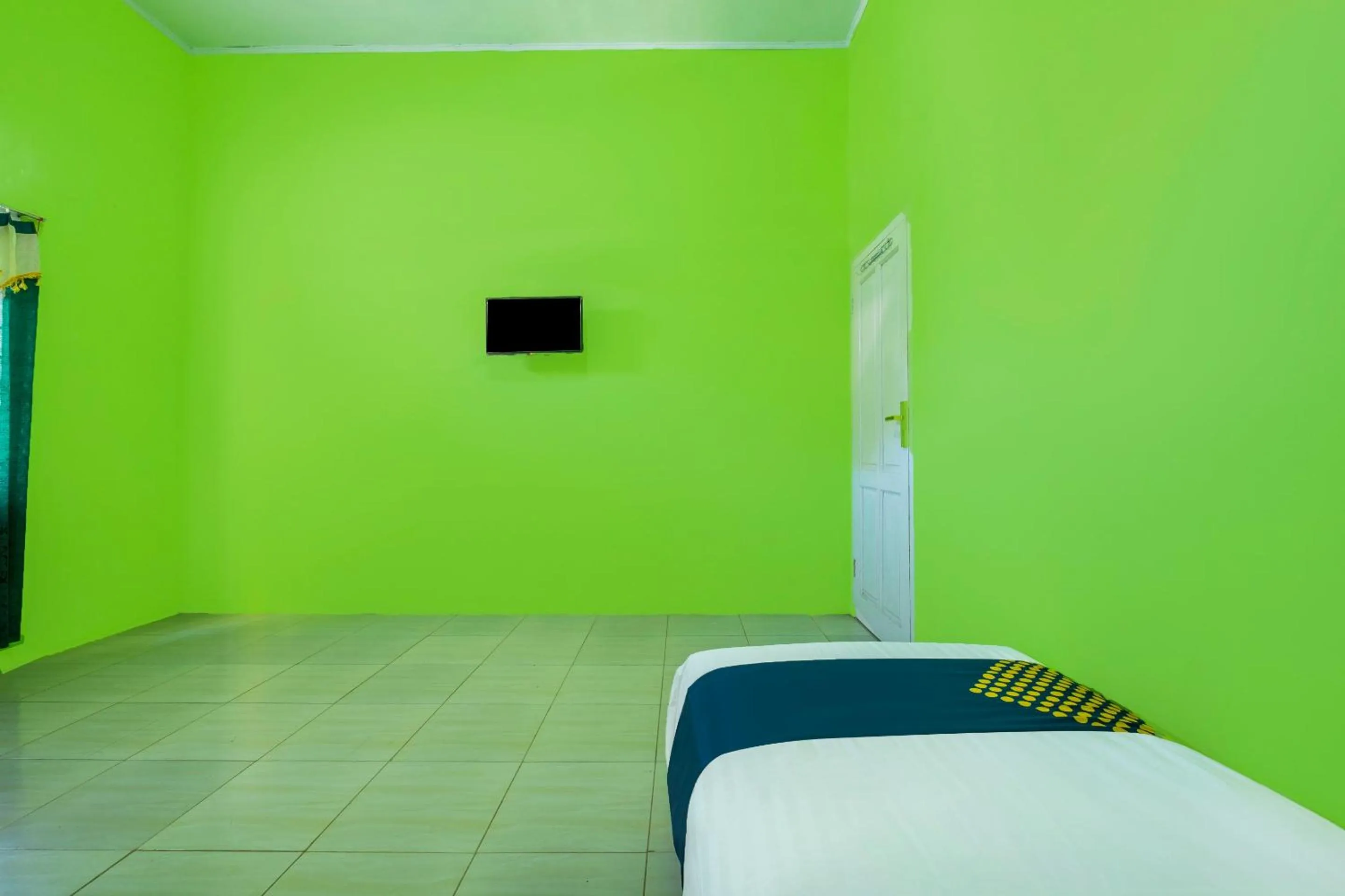 Bedroom in OYO 2859 Fatan Costel Syariah