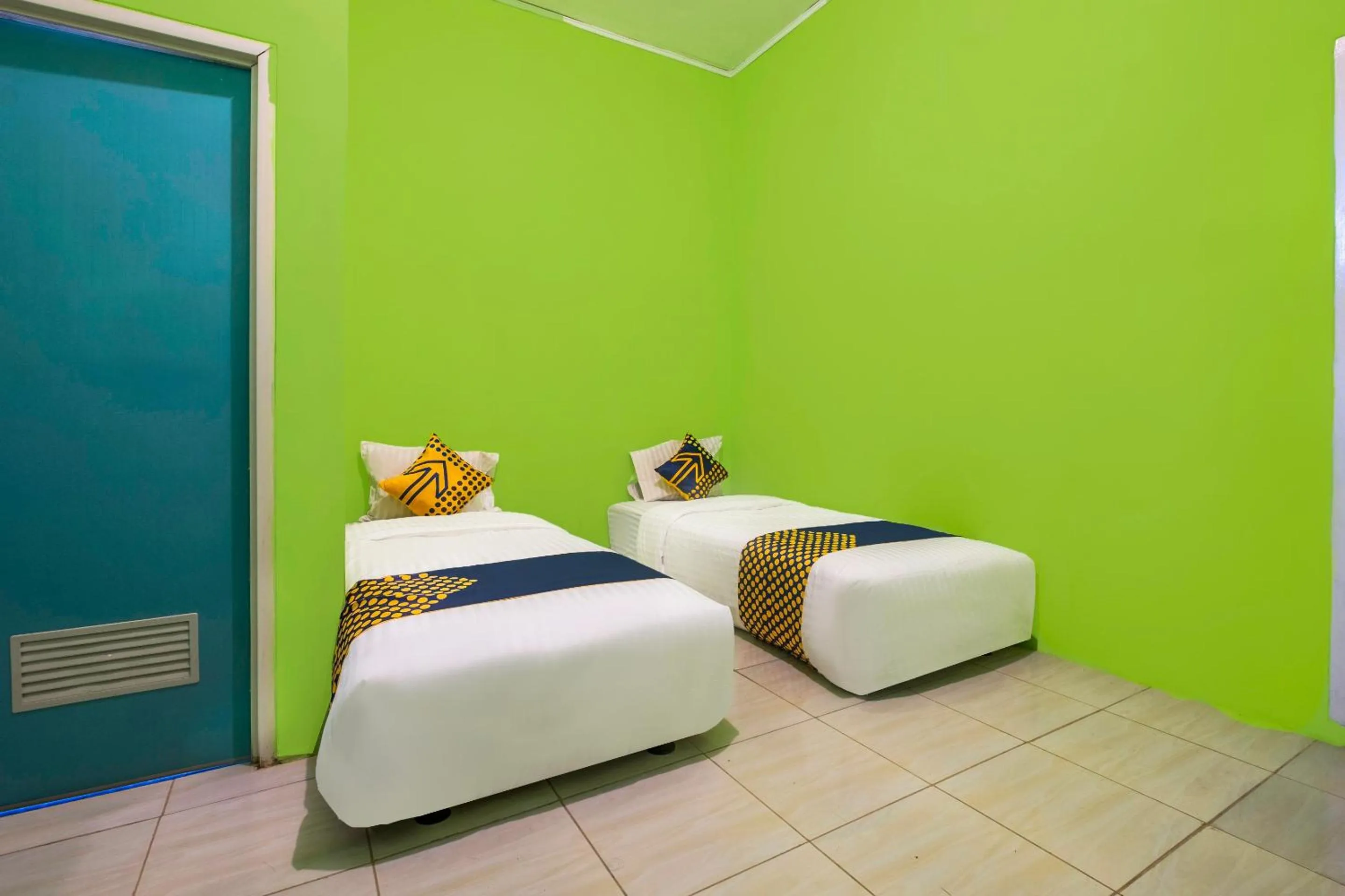 Bedroom in OYO 2859 Fatan Costel Syariah