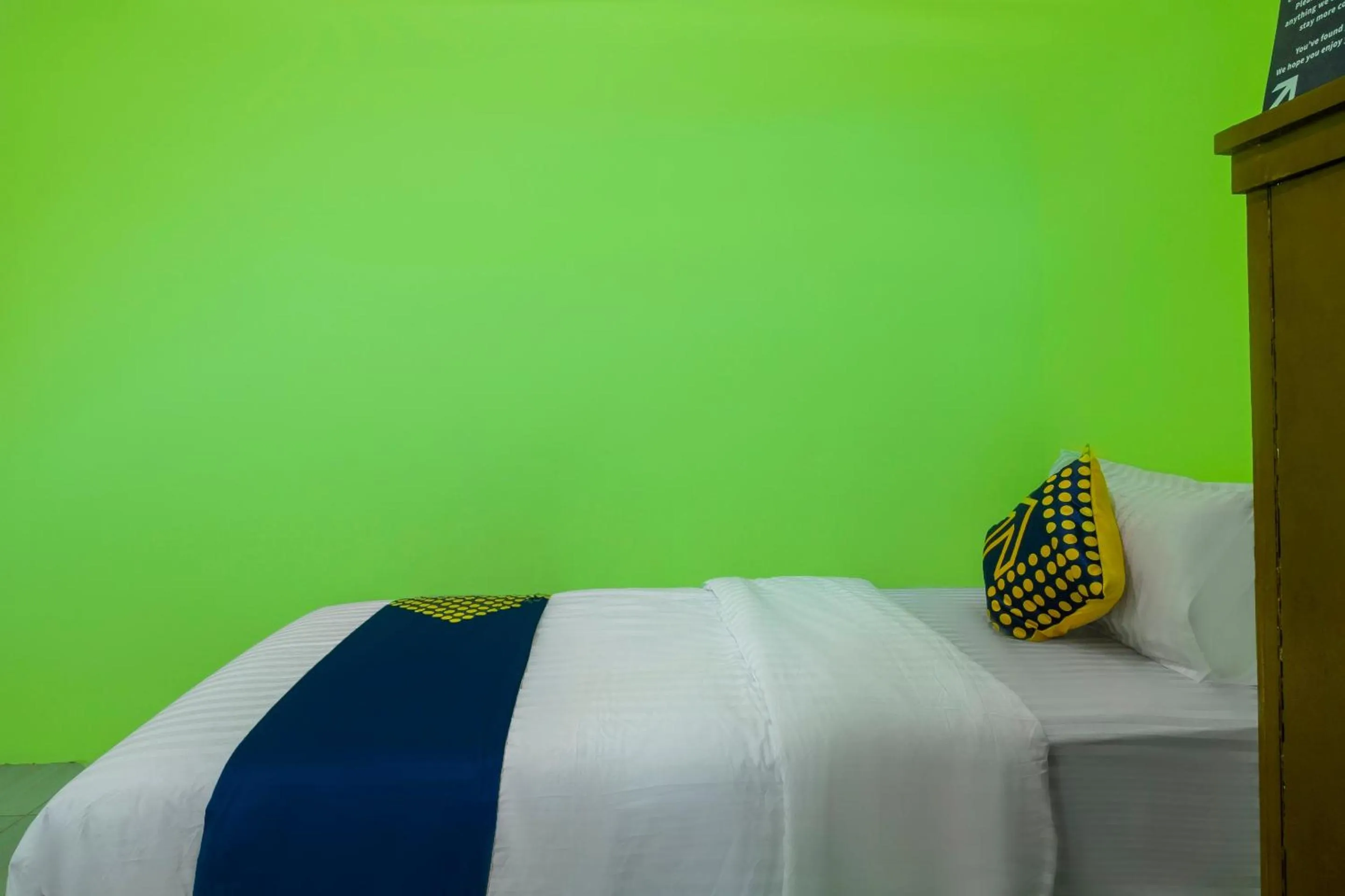 Bedroom in OYO 2859 Fatan Costel Syariah