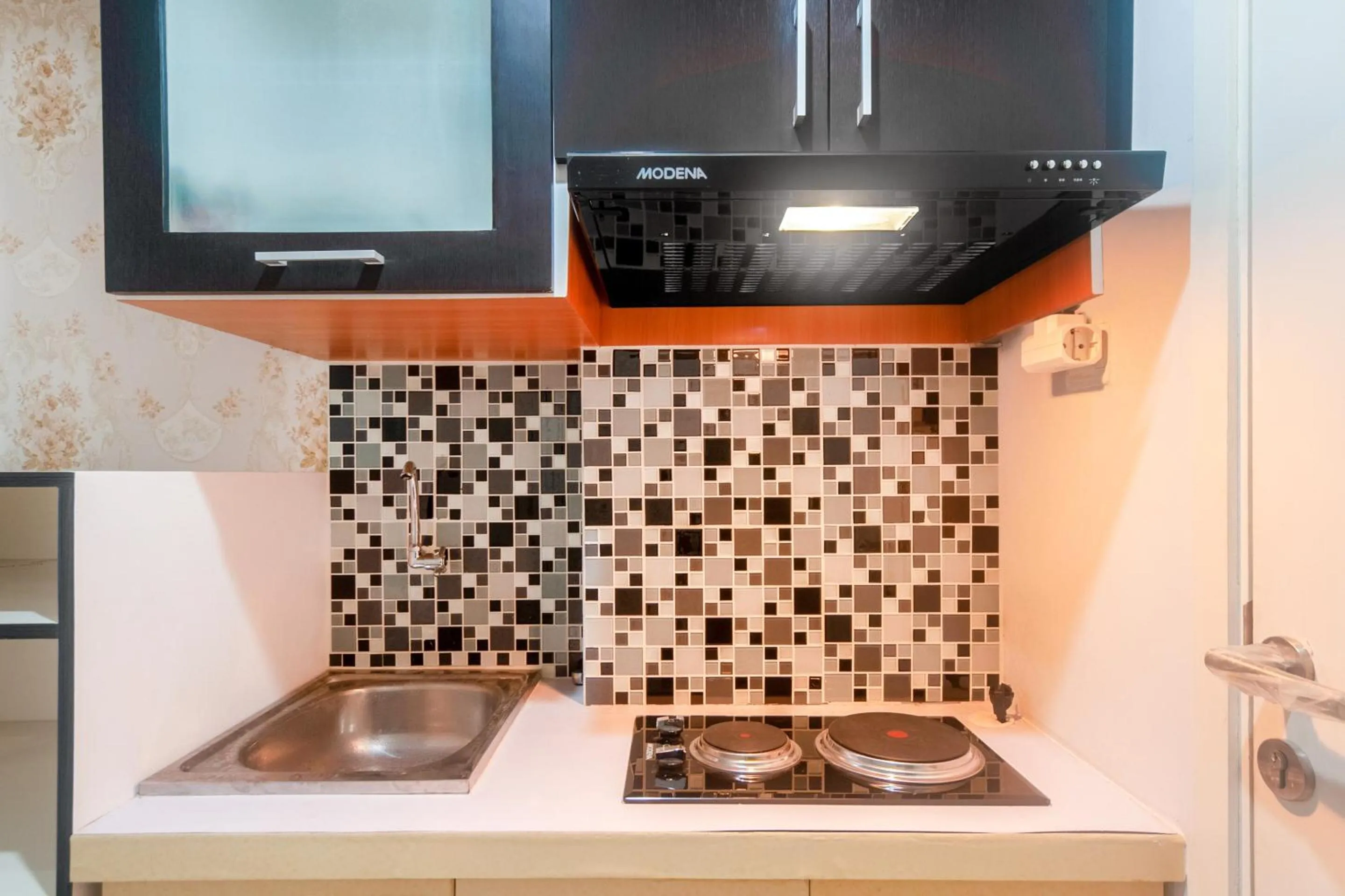 Kitchen or kitchenette in OYO Life 2837 Apartment Dramaga Tower