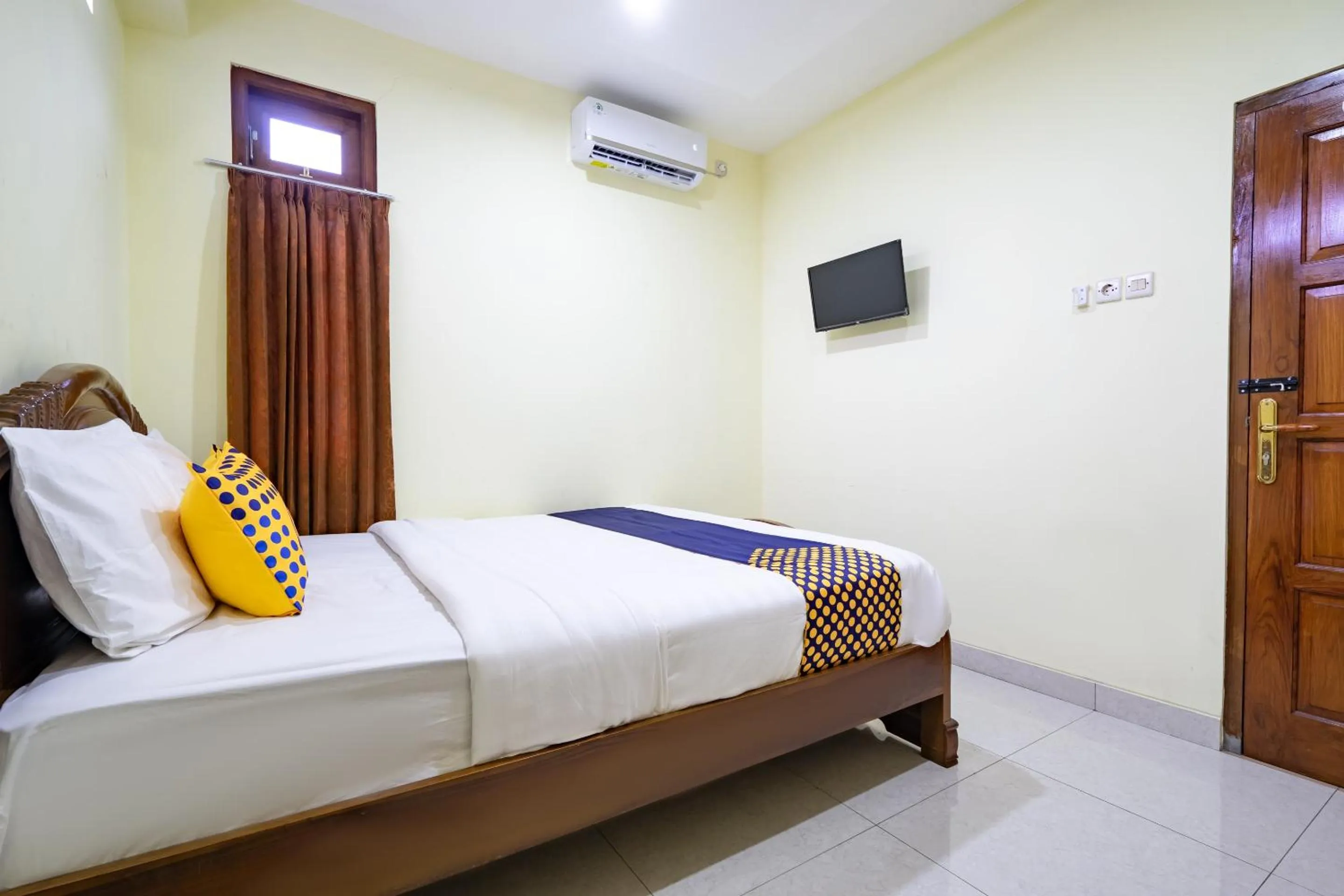 Bedroom in Hotel O Nabila Homestay