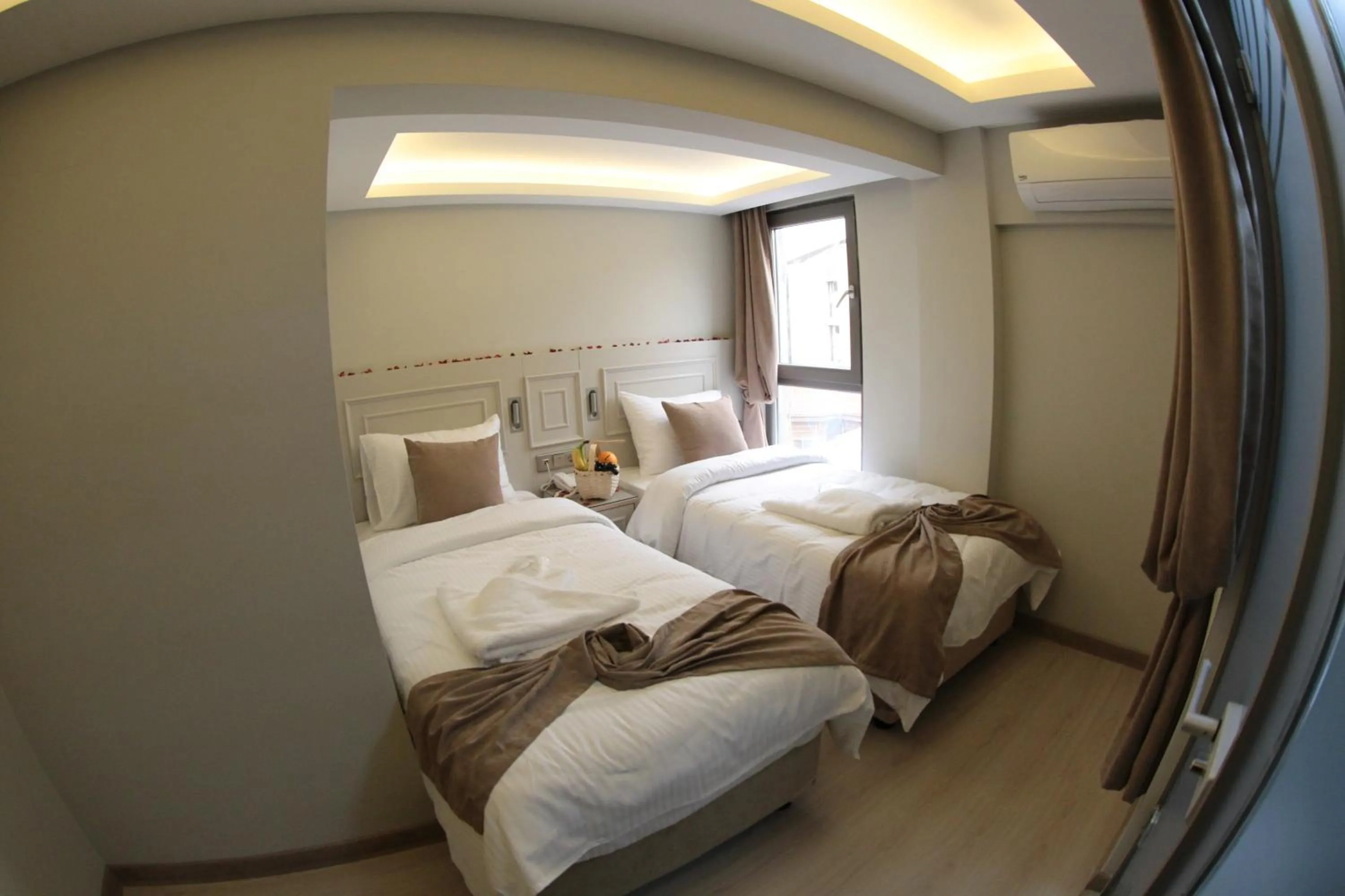 Bed in X-NELLYİ HOTEL