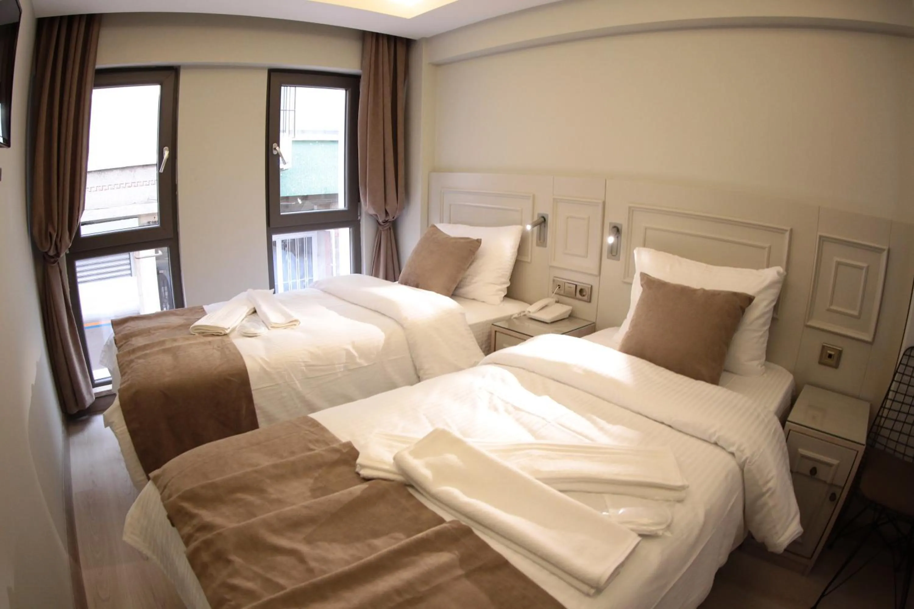 Bed in X-NELLYİ HOTEL