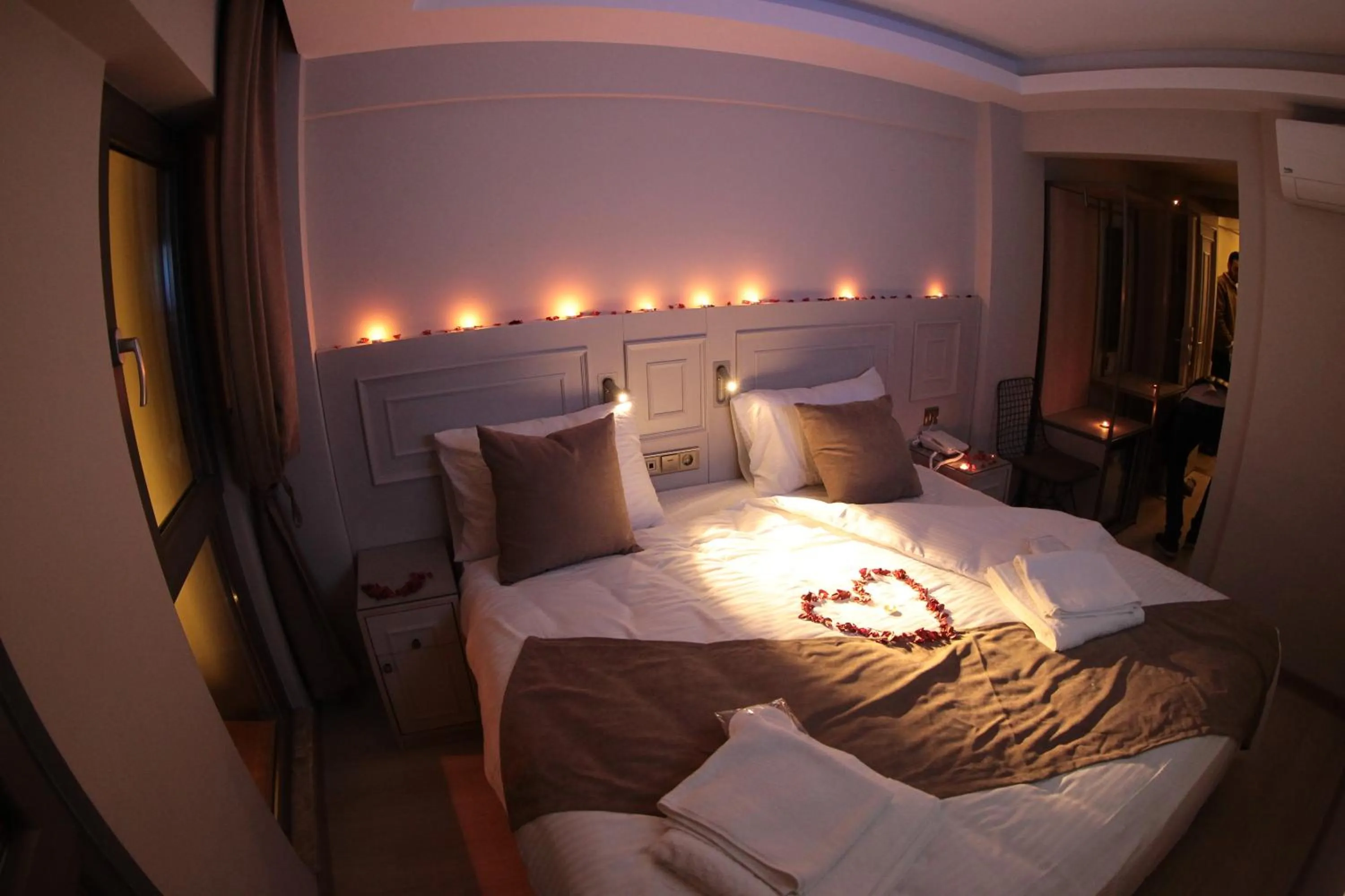 Bed in X-NELLYİ HOTEL