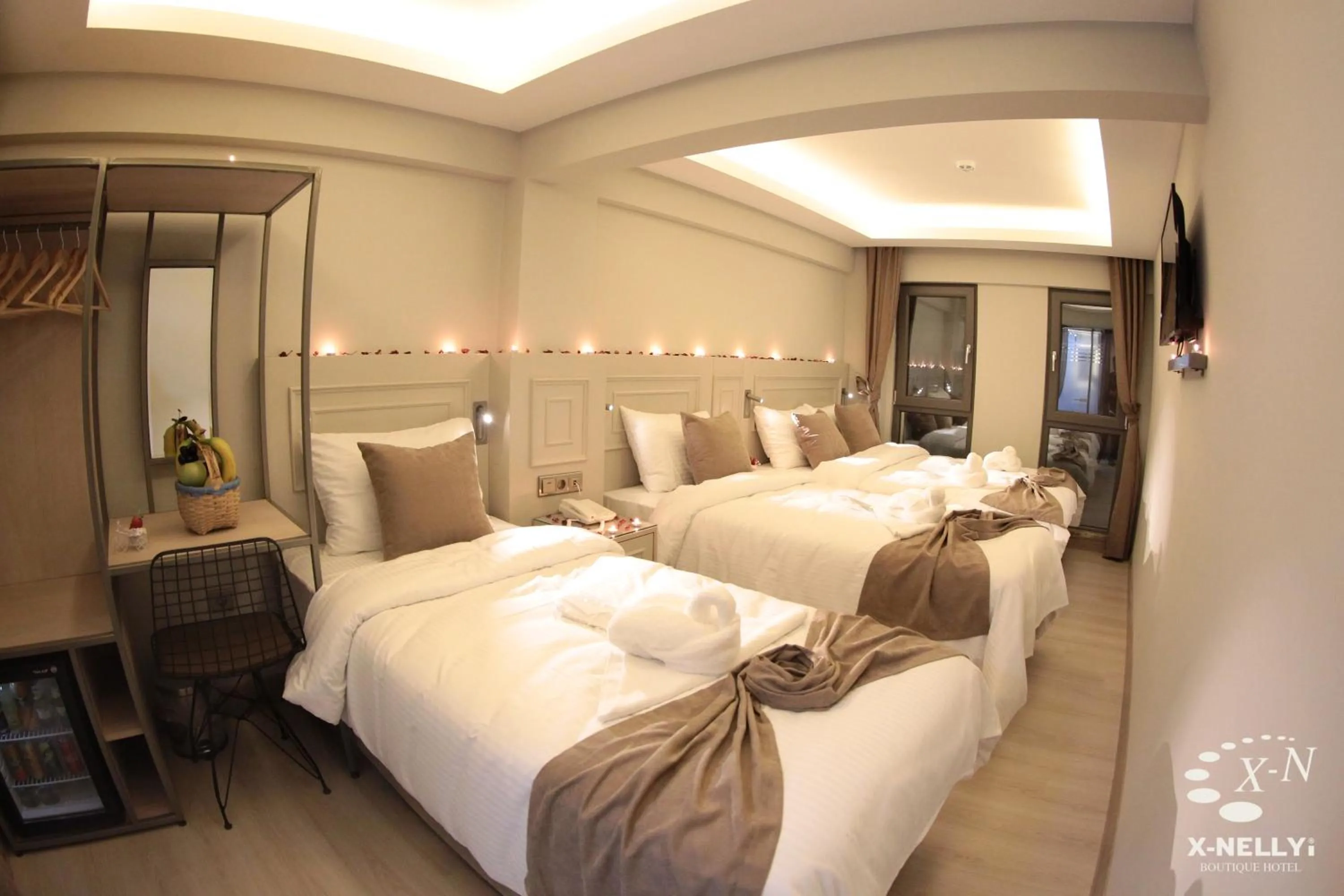 Bed in X-NELLYİ HOTEL