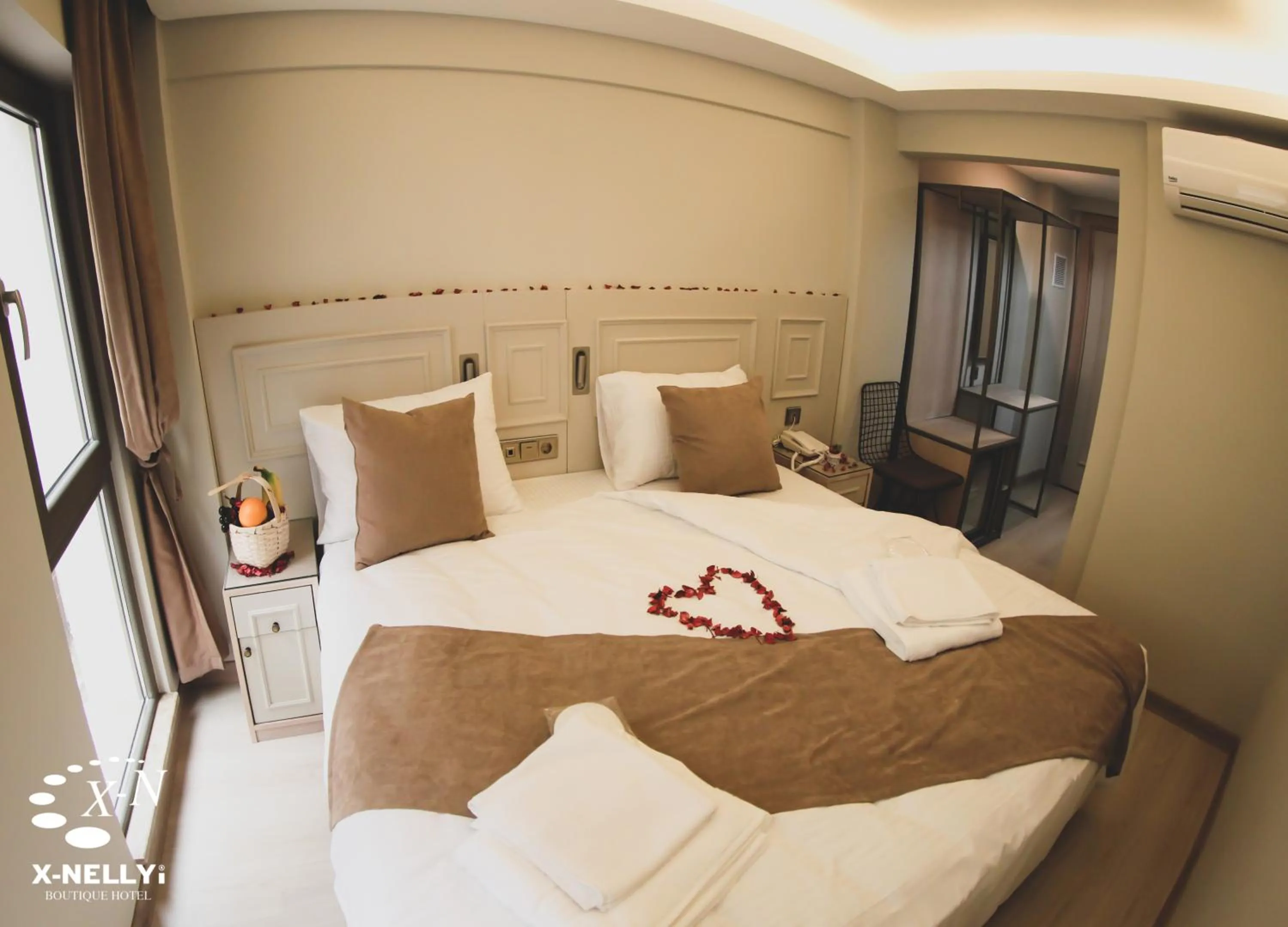 Bed in X-NELLYİ HOTEL