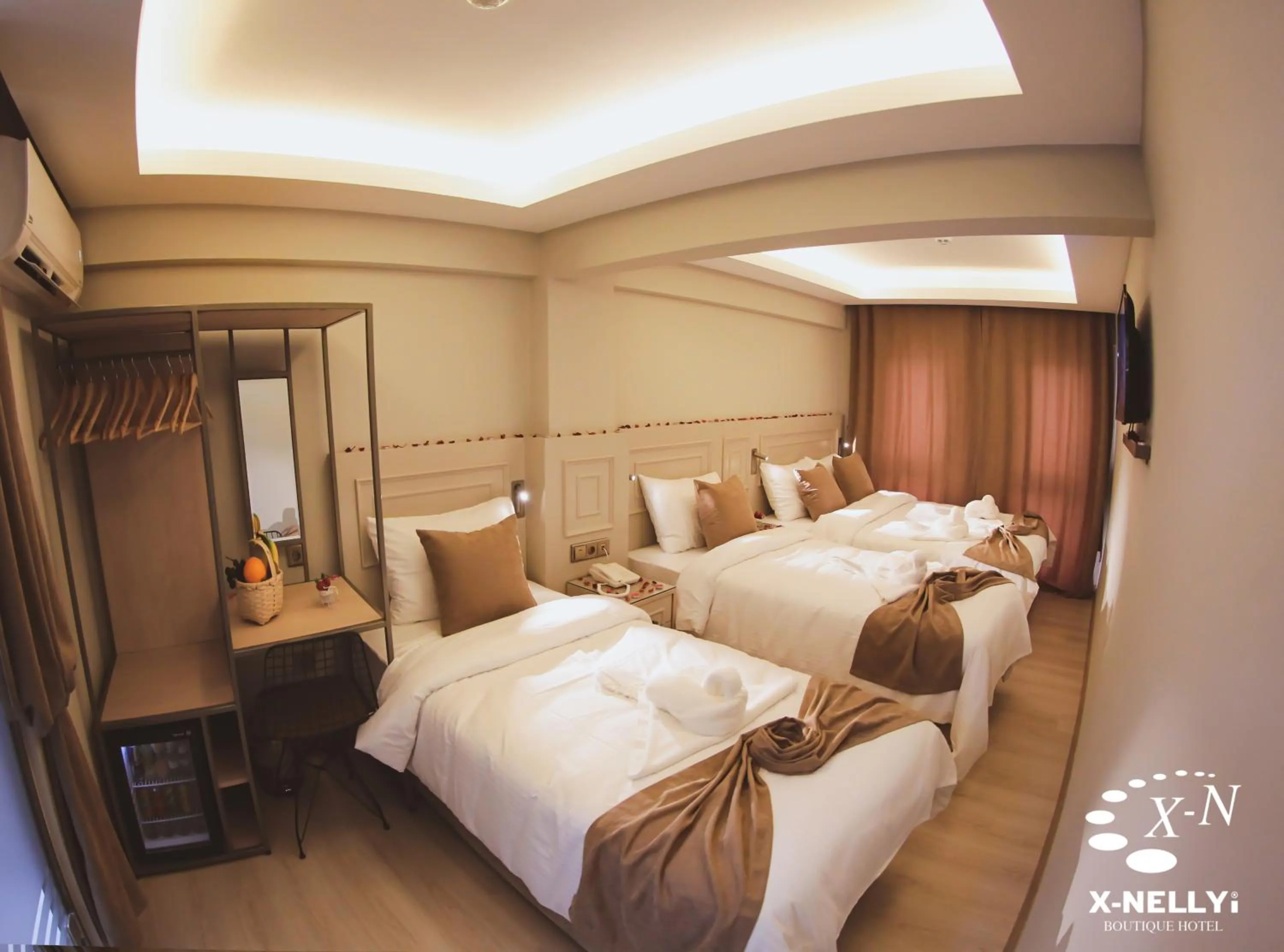 Bed in X-NELLYİ HOTEL