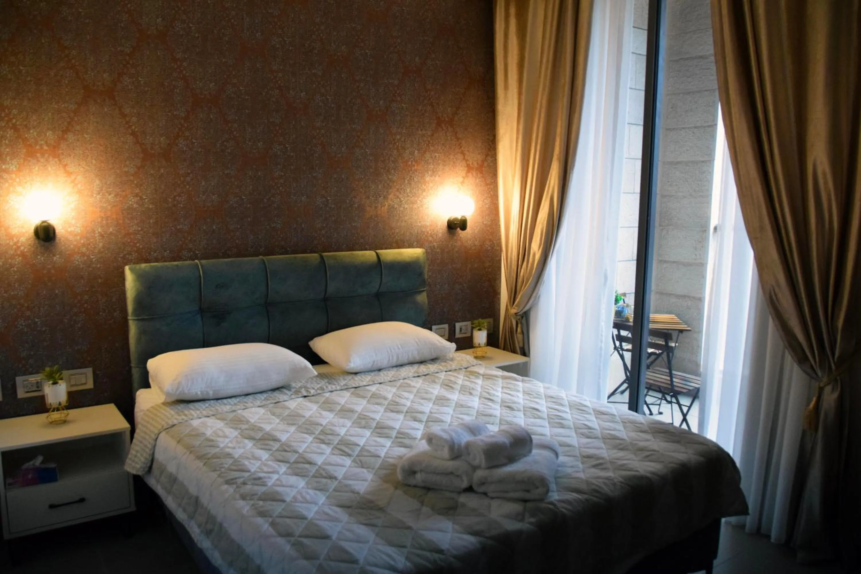 Bed in Amwaj Apartments