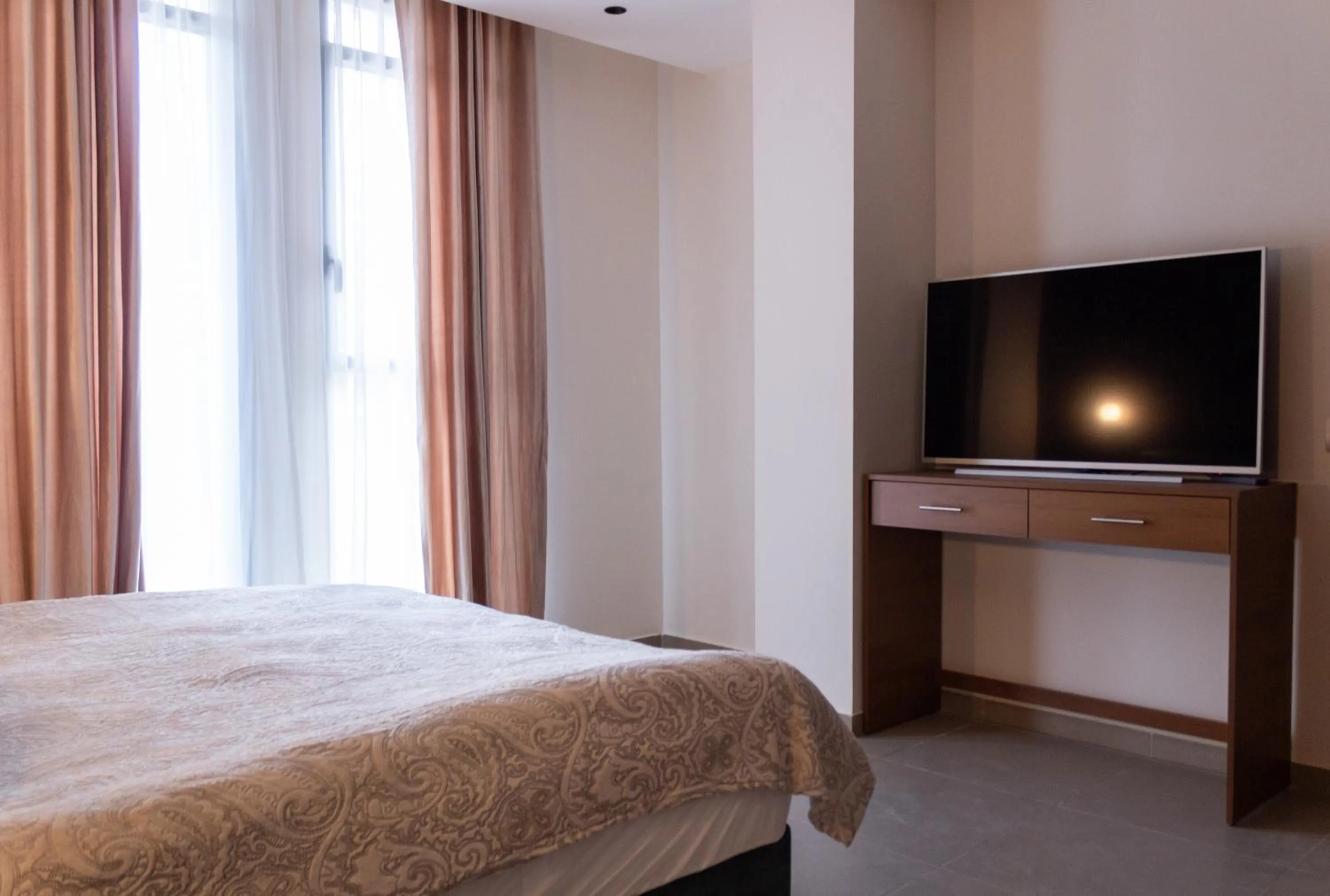 Bed in Amwaj Apartments