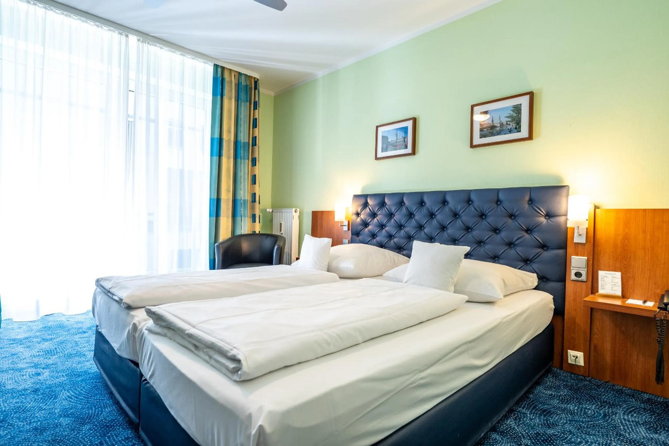 Photo of the whole room, Bed in Hotel Hanseport Hamburg