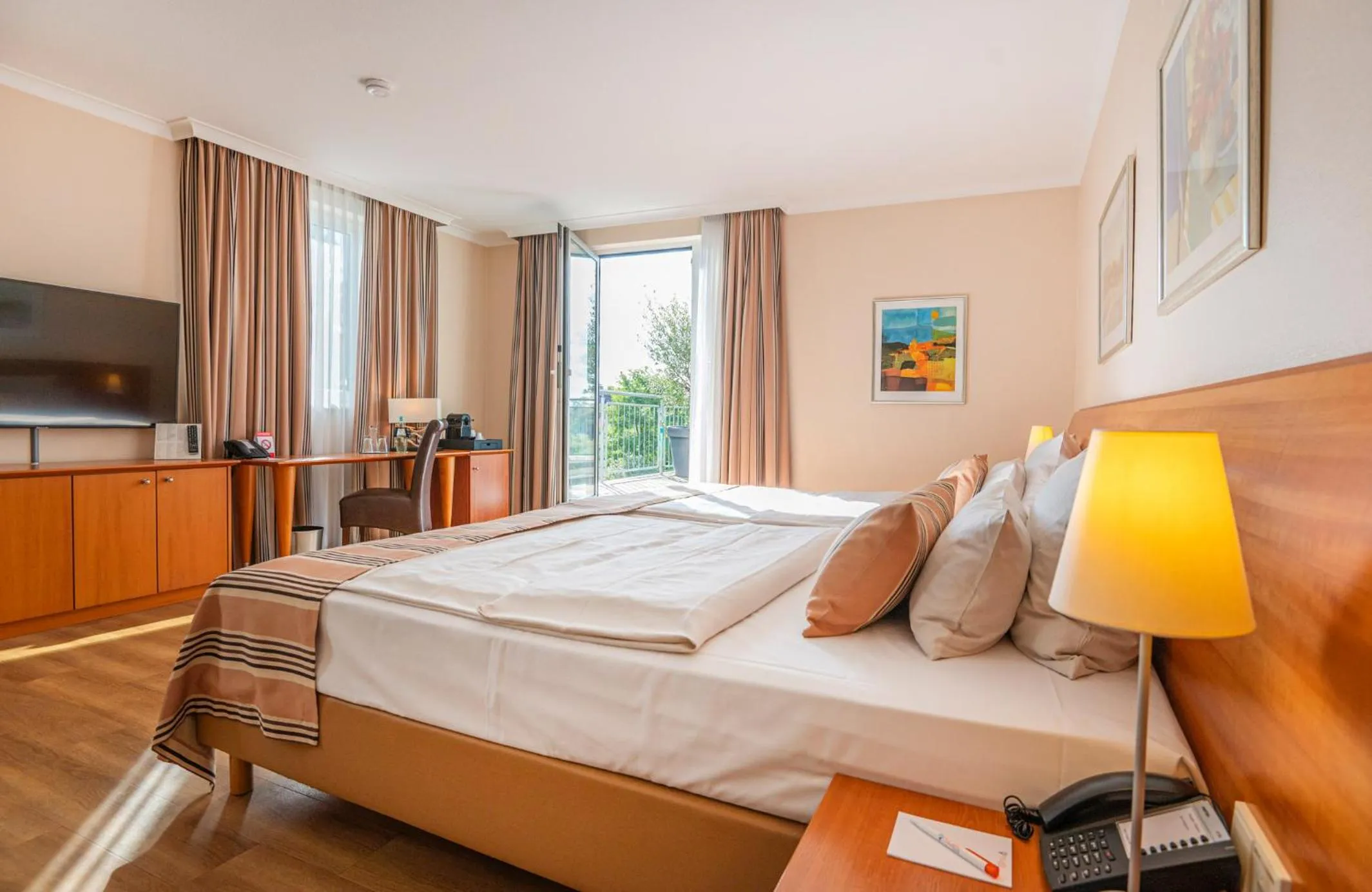 Photo of the whole room, Bed in PhiLeRo Hotel Köln