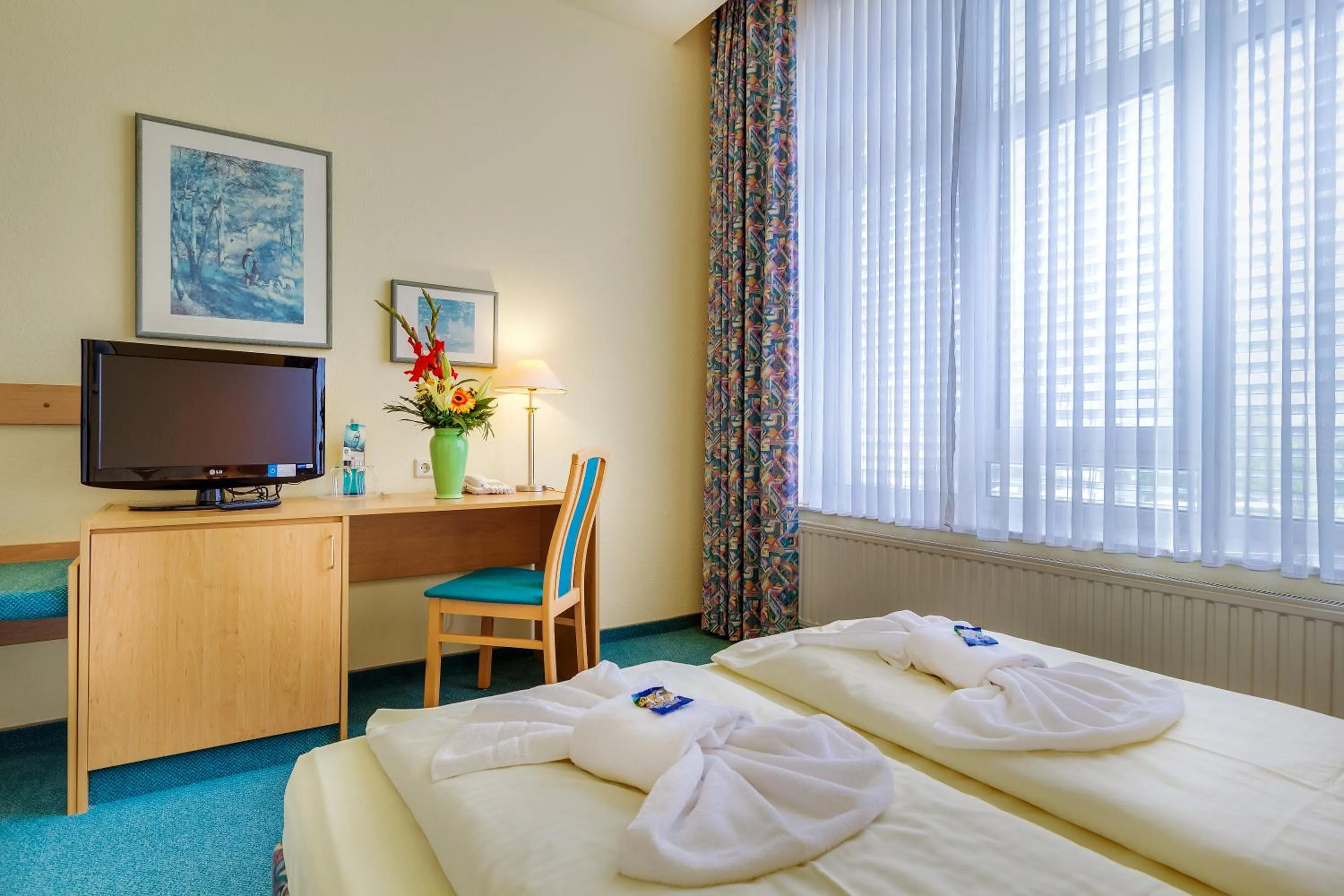 Photo of the whole room, Bed in Hotel Alte Klavierfabrik Meißen