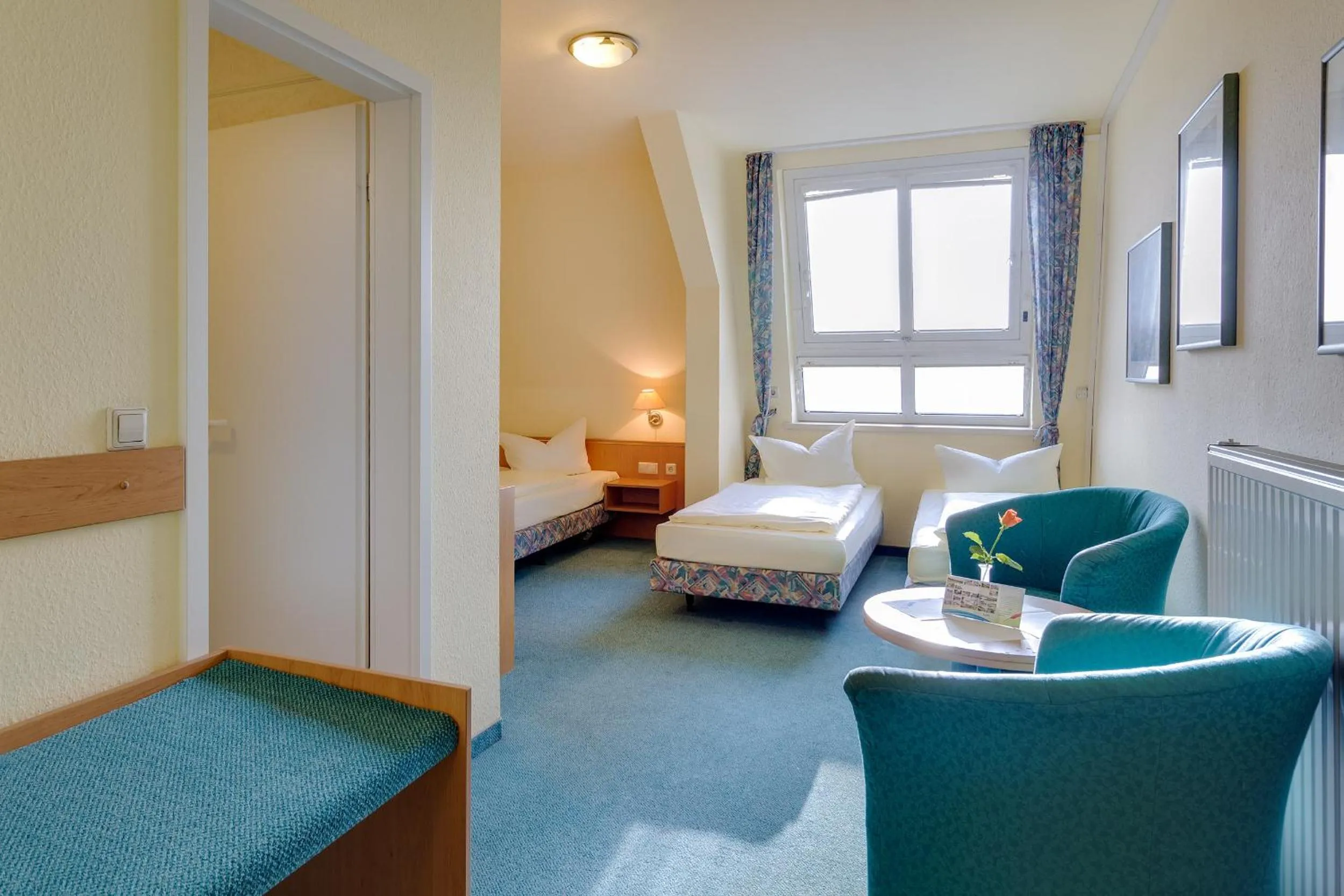 Photo of the whole room, Bed in Hotel Alte Klavierfabrik Meißen