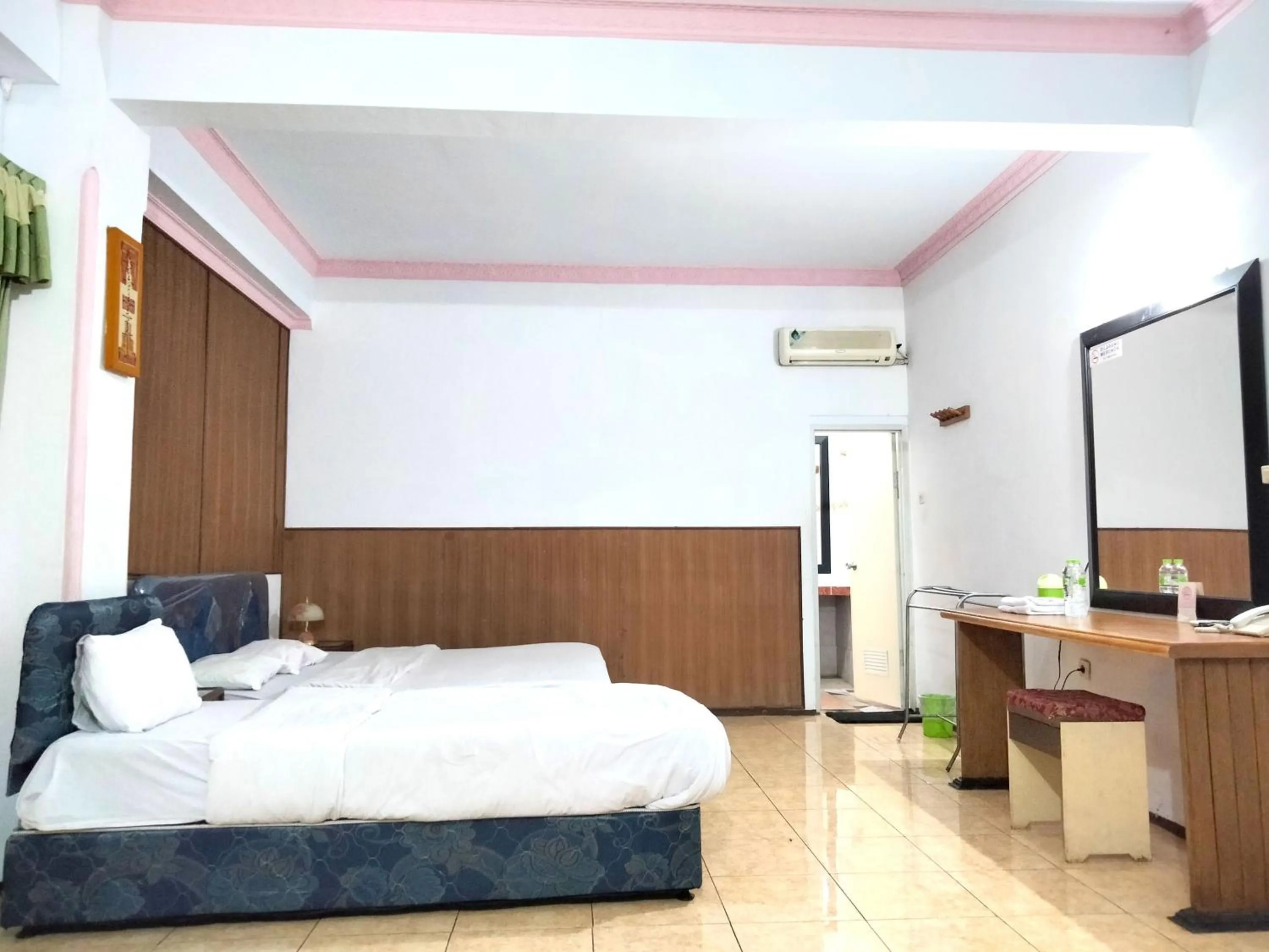 Bedroom, Bed in Sartika Hotel Mitra RedDoorz Pati