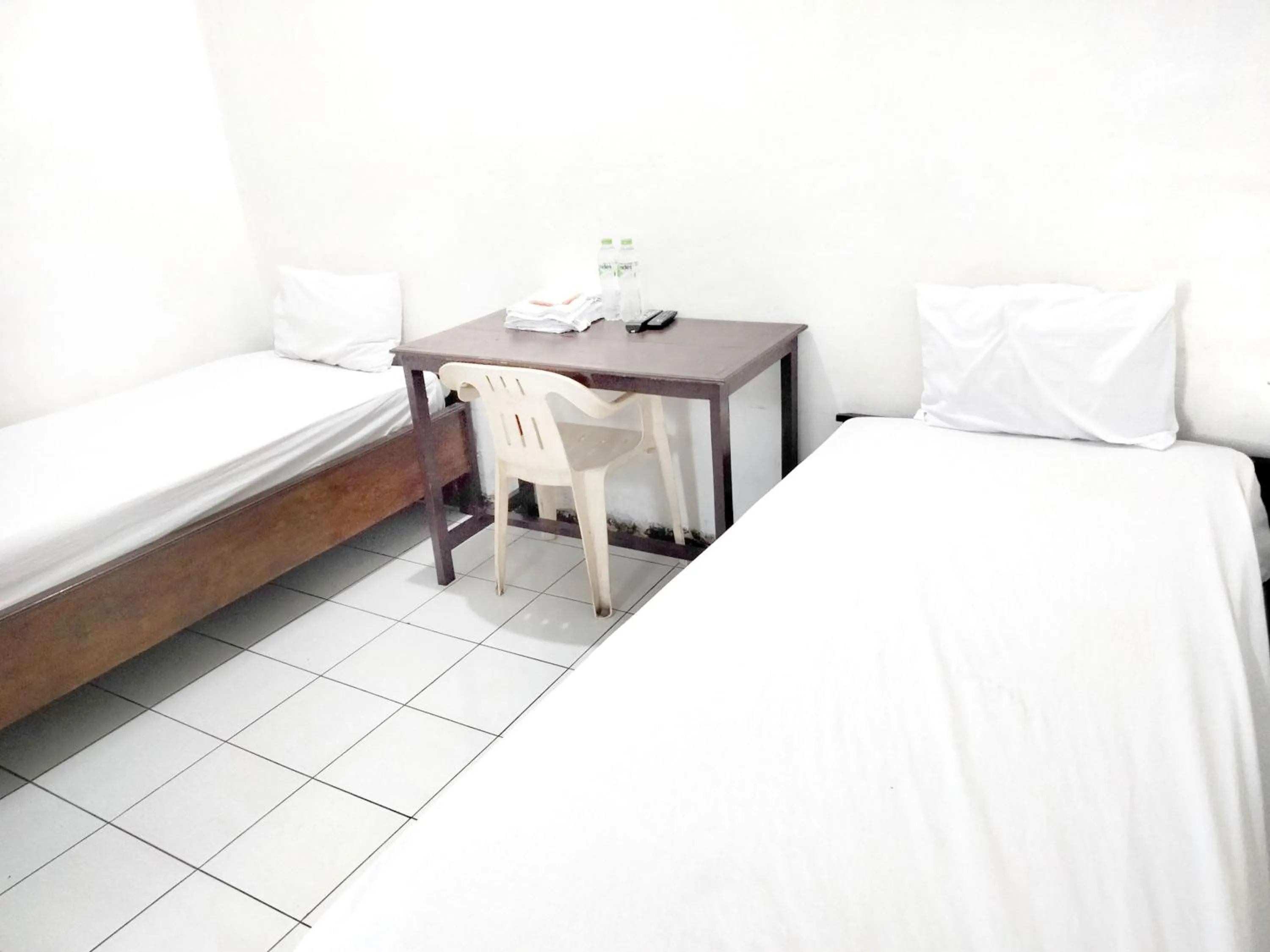 Bedroom, Bed in Sartika Hotel Mitra RedDoorz Pati