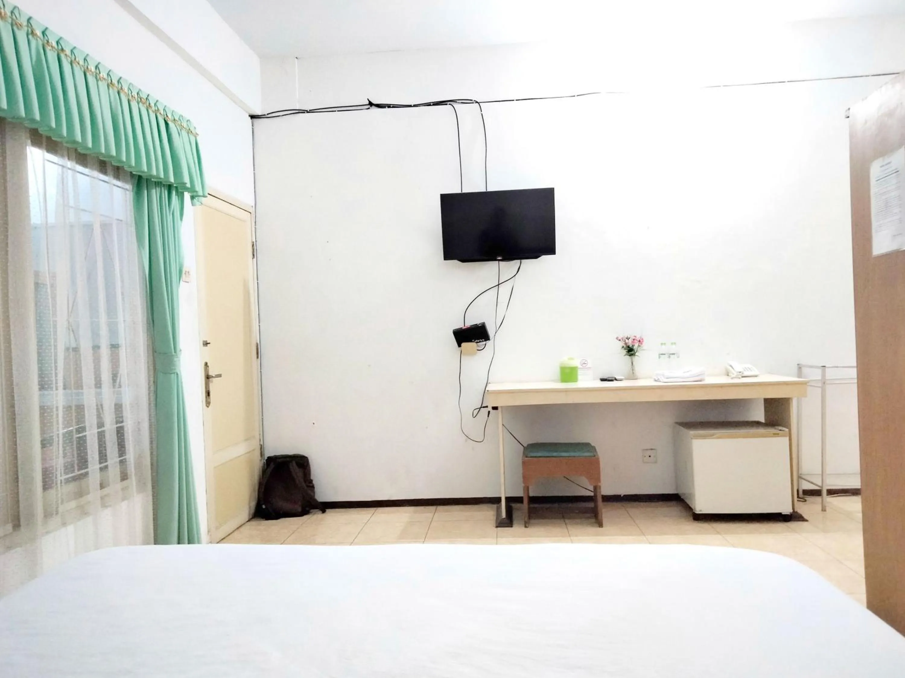 Bedroom, Bed in Sartika Hotel Mitra RedDoorz Pati