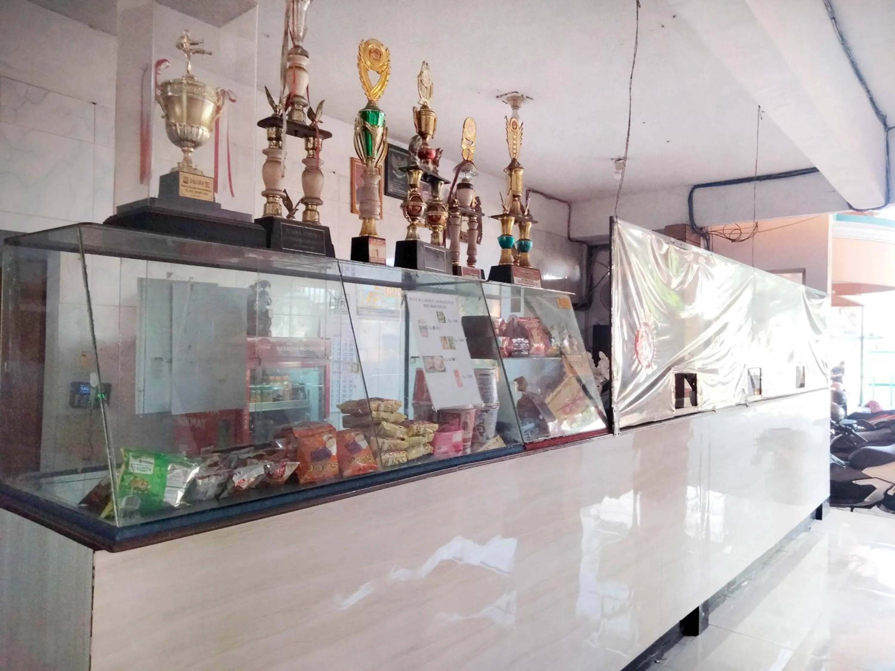 Lobby or reception in Sartika Hotel Mitra RedDoorz Pati