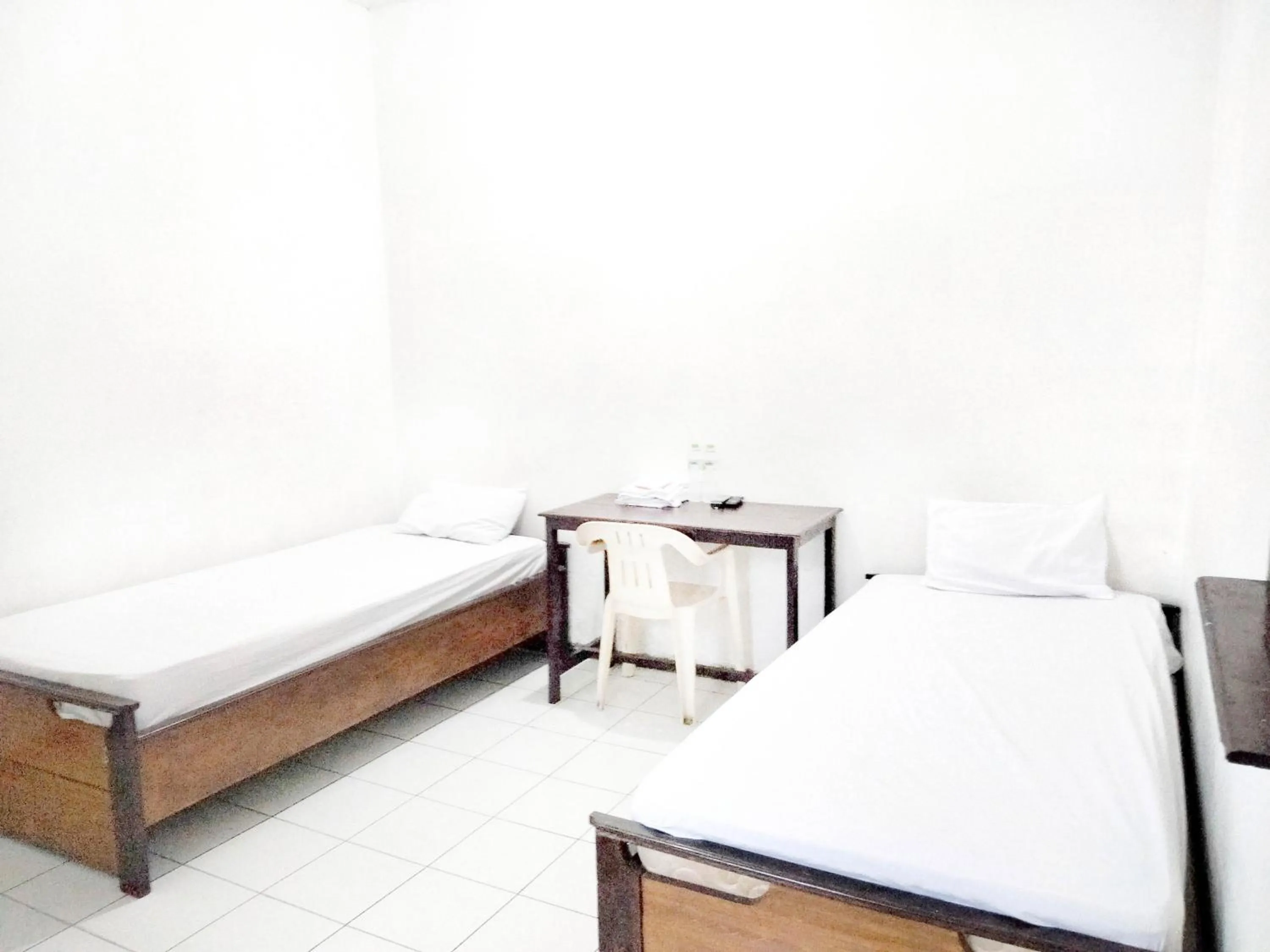 Bedroom, Bed in Sartika Hotel Mitra RedDoorz Pati