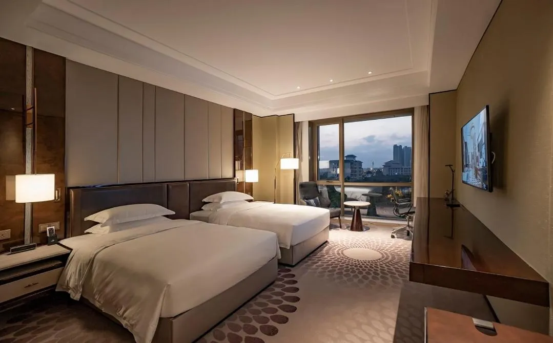 Bed in Vignette Collection Haikou Yatter Hotel by IHG