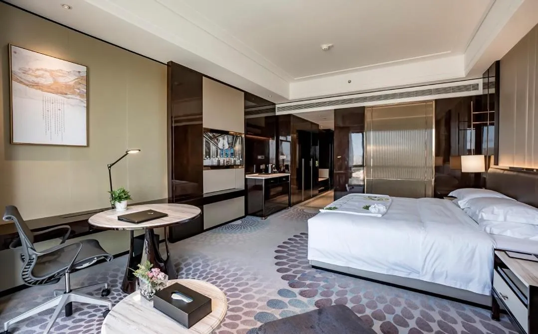 Bed in Vignette Collection Haikou Yatter Hotel by IHG