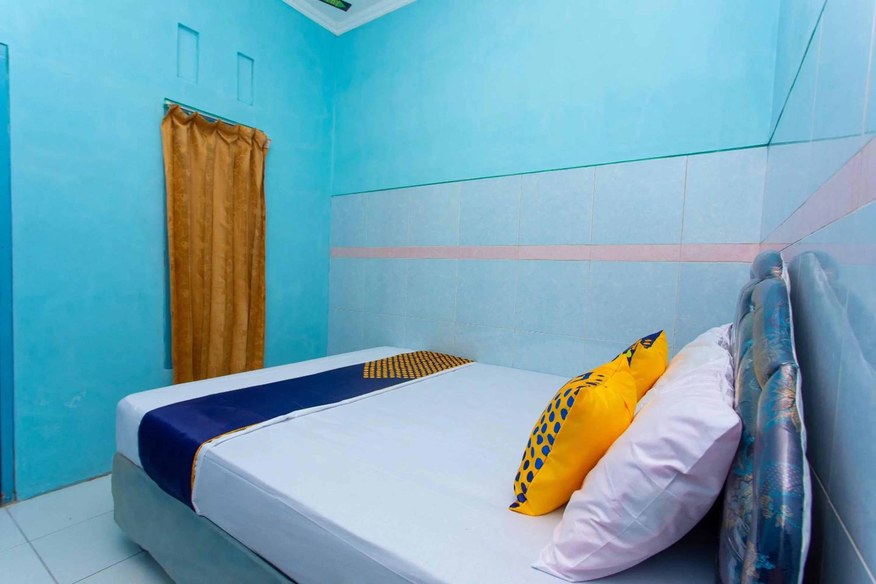 Bedroom in Hotel O Budi