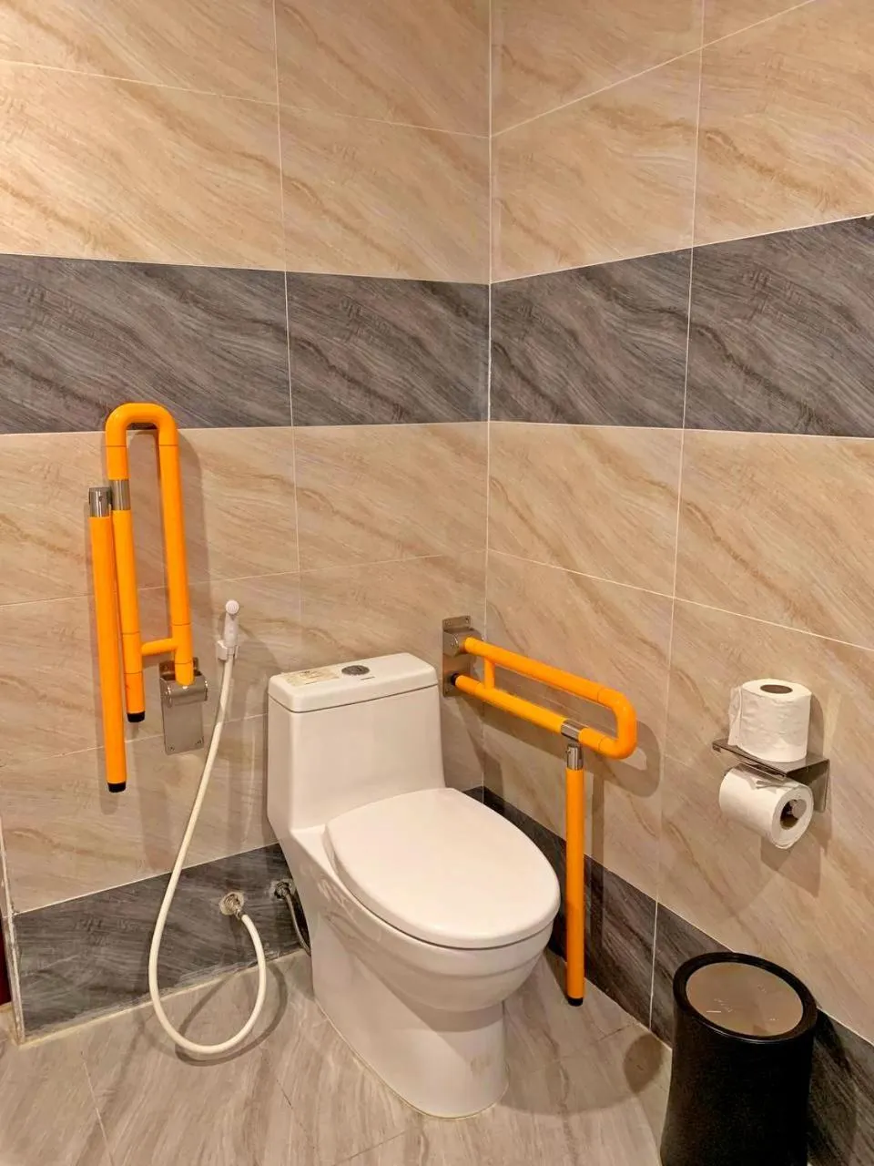 Toilet in Poulo Wai Hotel, Trademark Collection by Wyndham