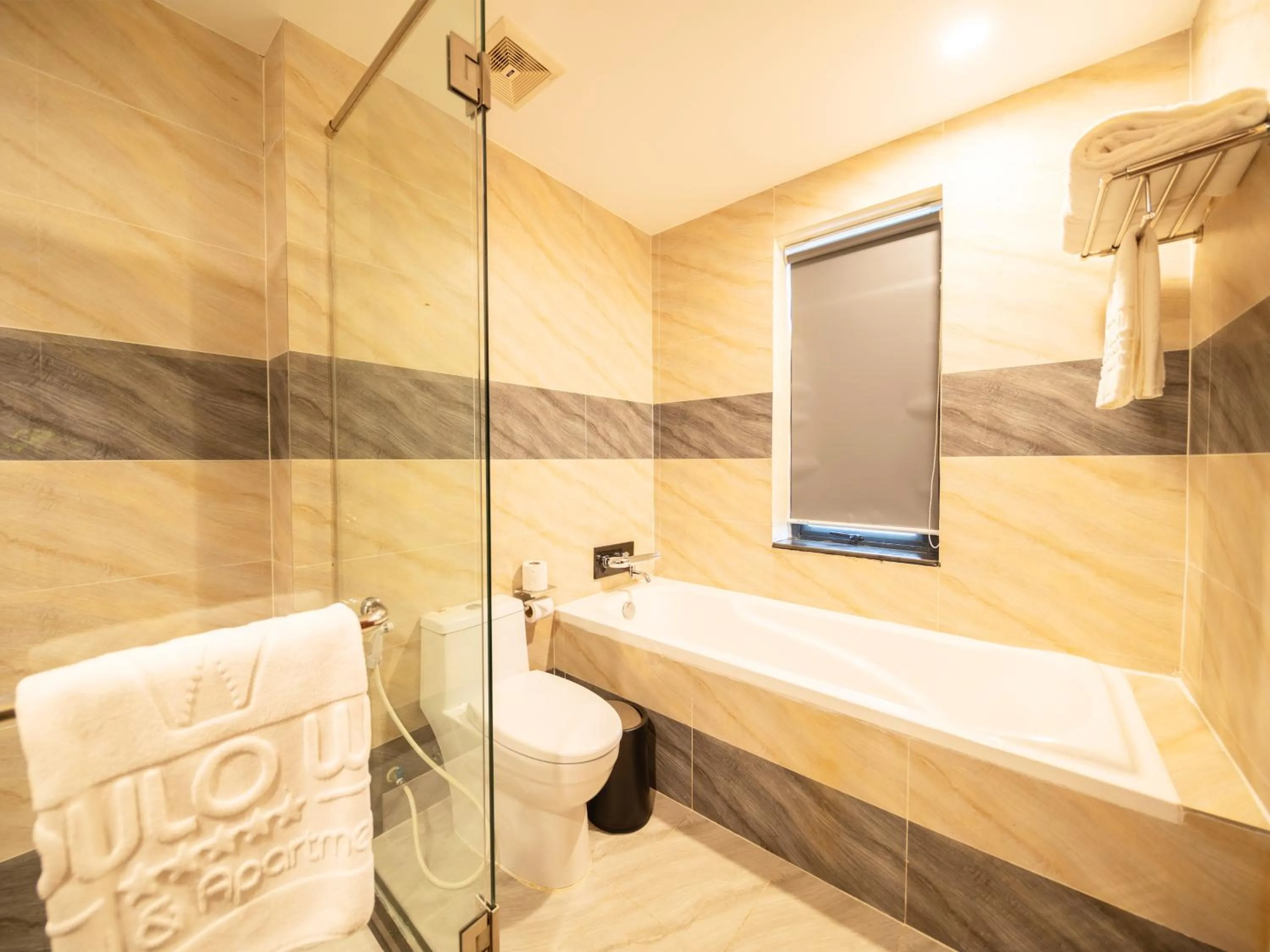 Bathroom in Poulo Wai Hotel, Trademark Collection by Wyndham