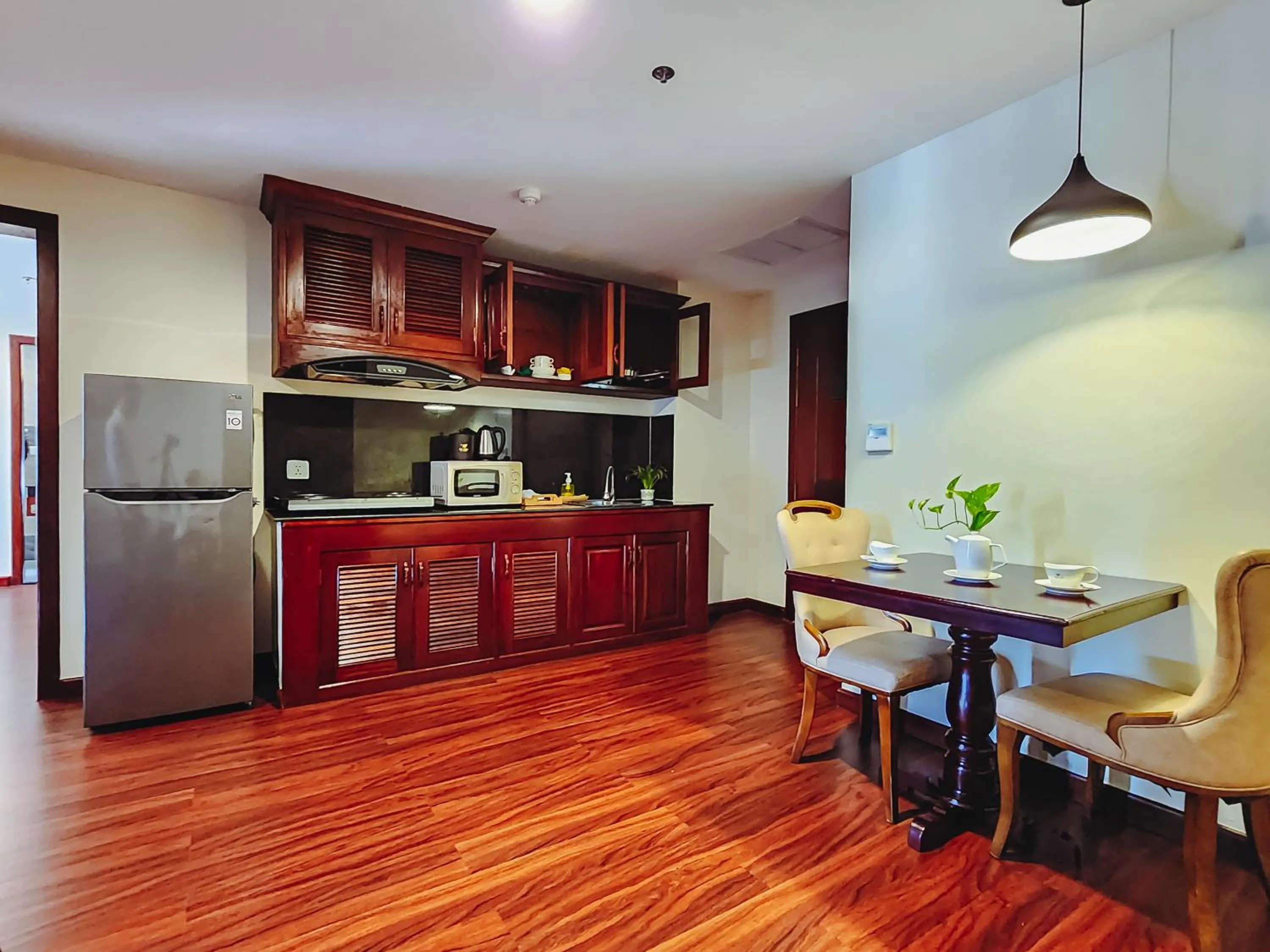 Kitchen or kitchenette in Poulo Wai Hotel, Trademark Collection by Wyndham