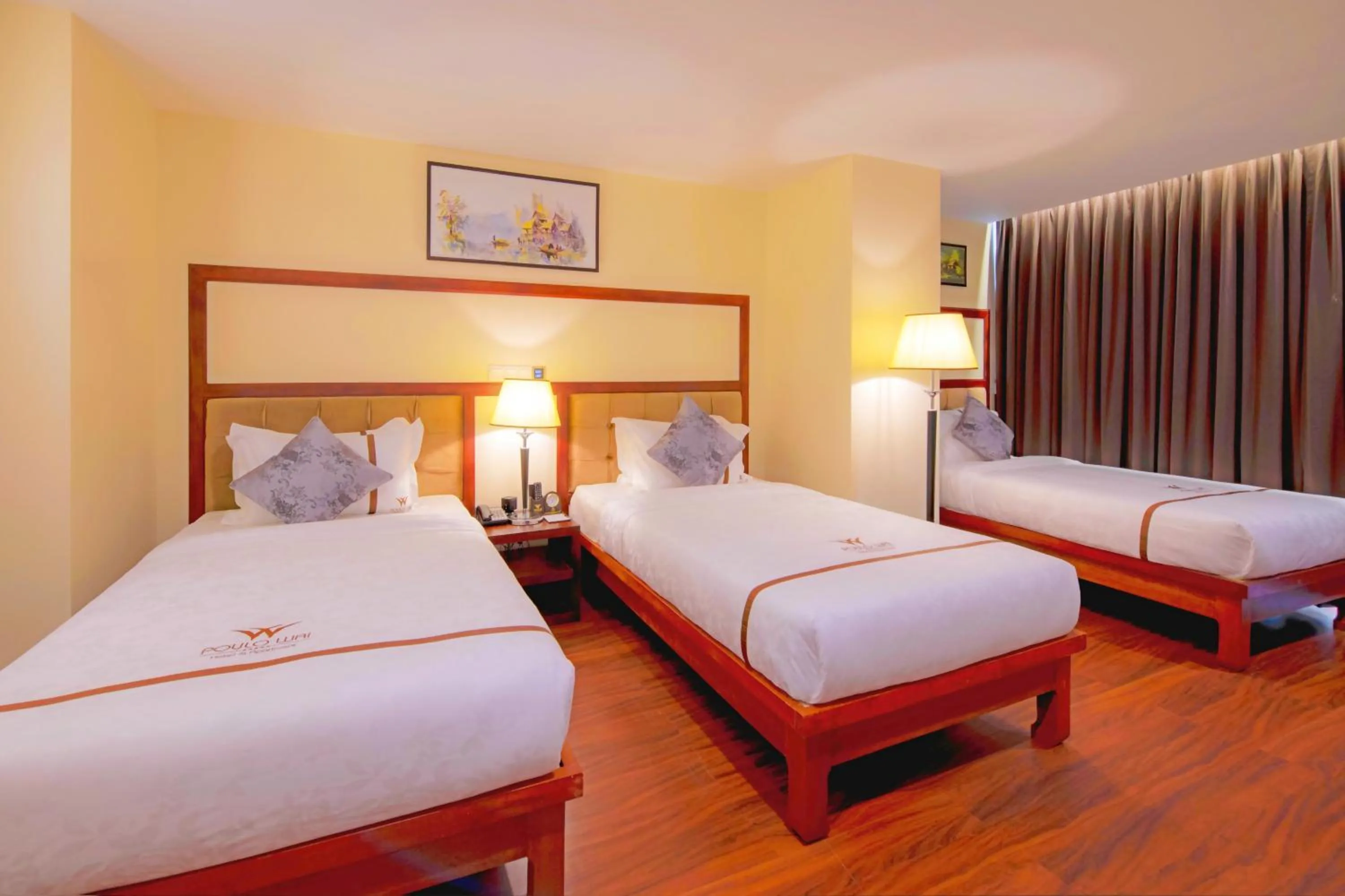 Bed in Poulo Wai Hotel, Trademark Collection by Wyndham