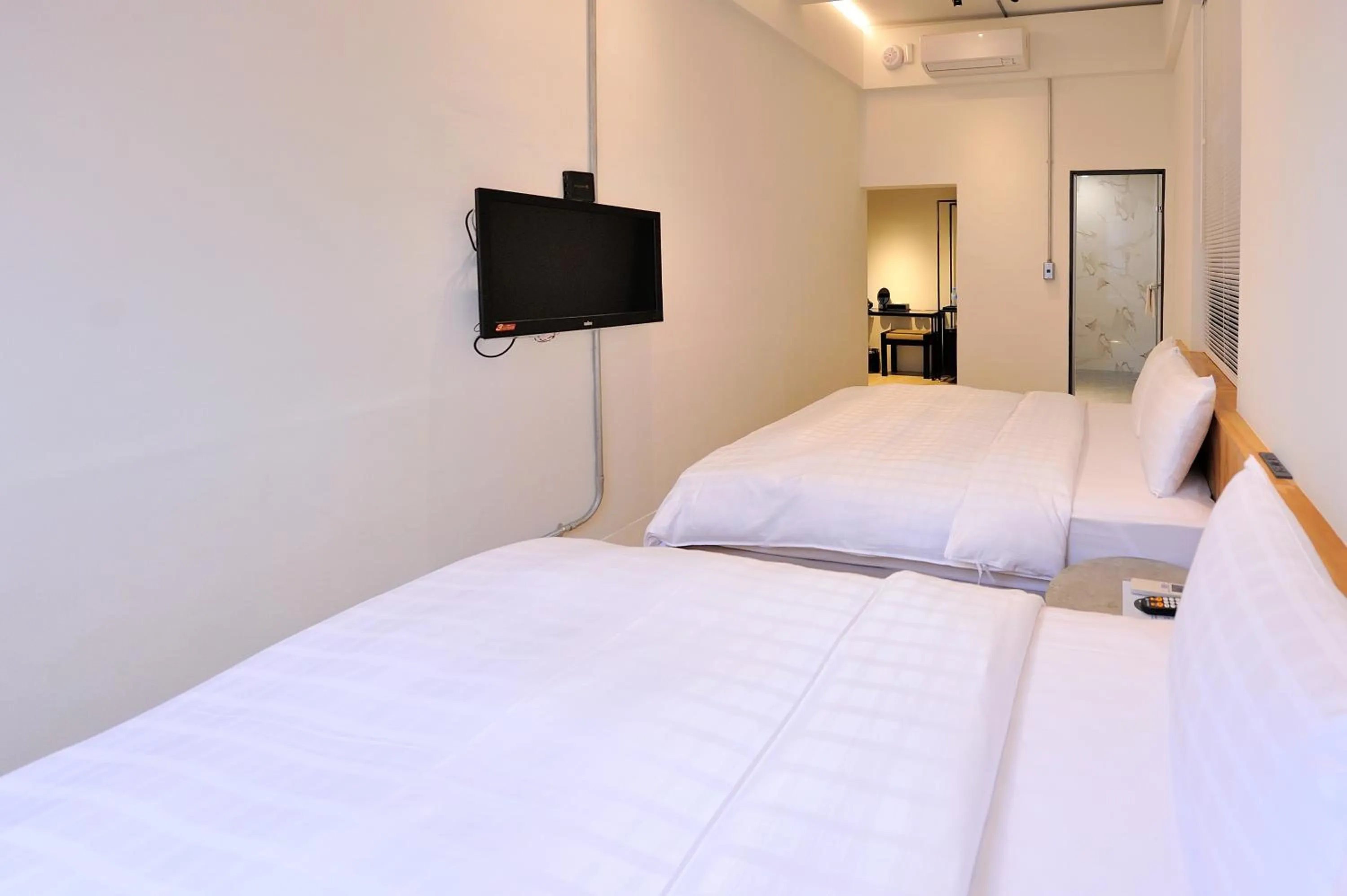 Bed in Home Rest Hotel 2