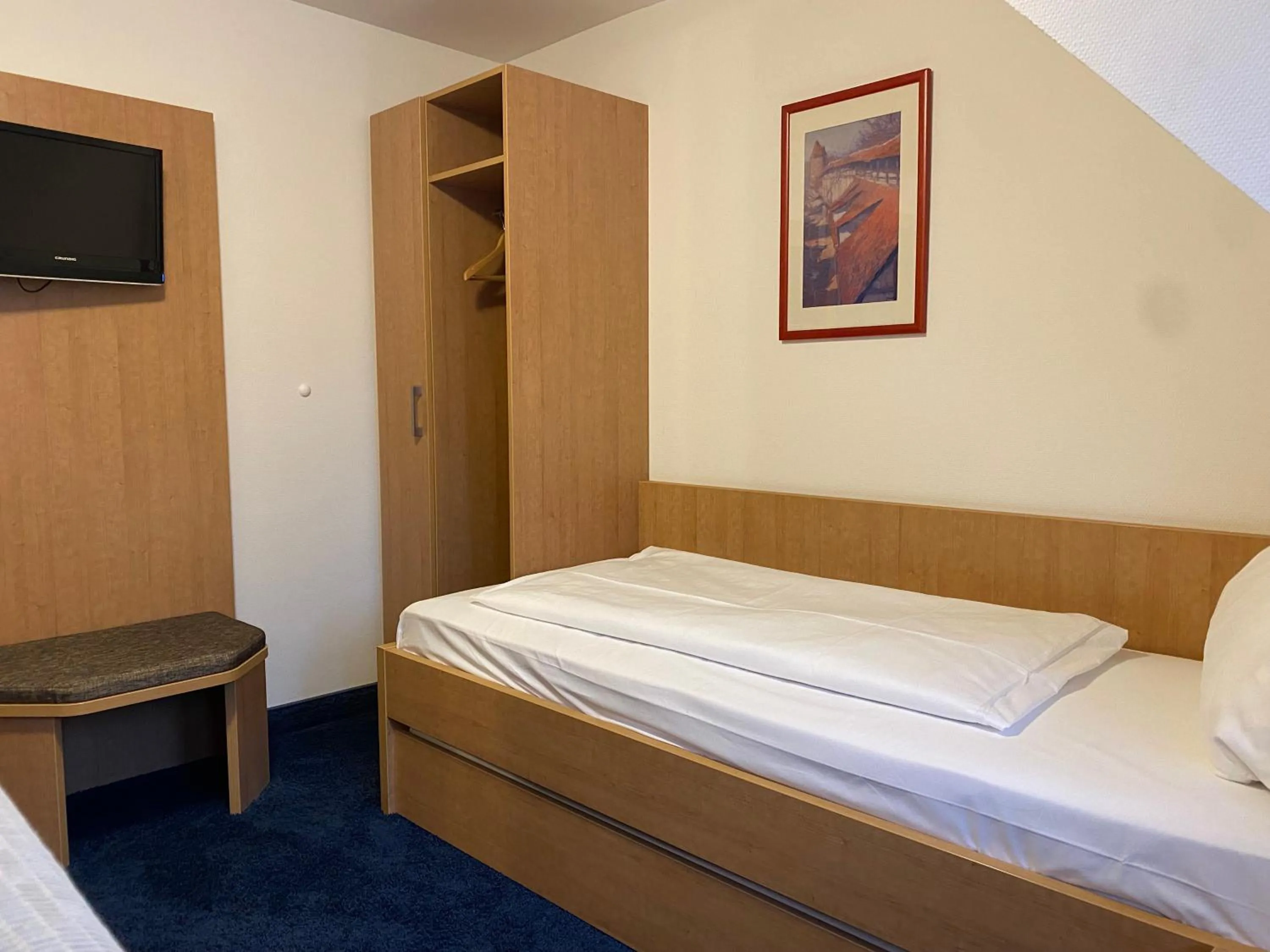 Photo of the whole room, Bed in Akzent Hotel Schranne