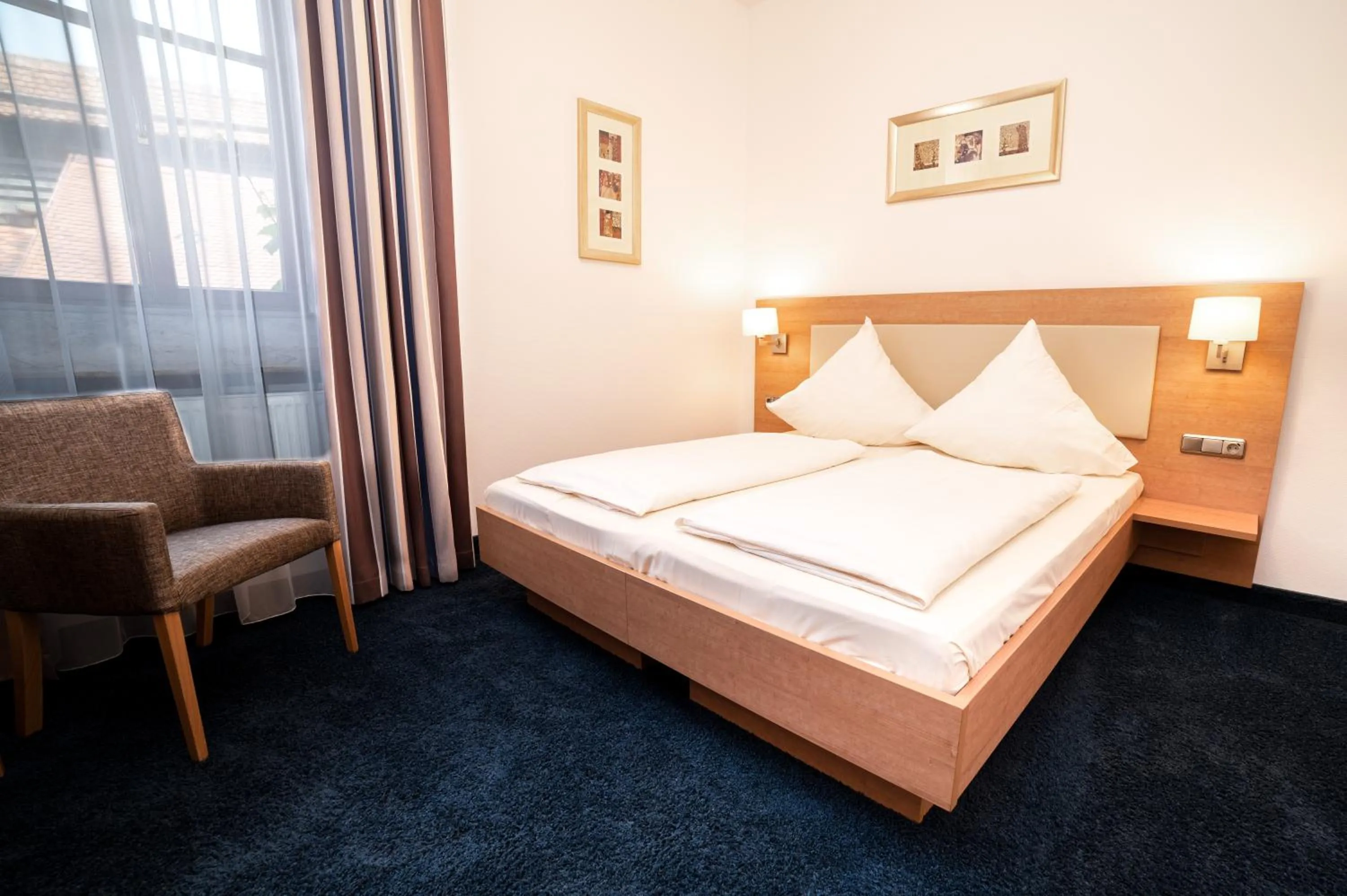 Photo of the whole room, Bed in Akzent Hotel Schranne