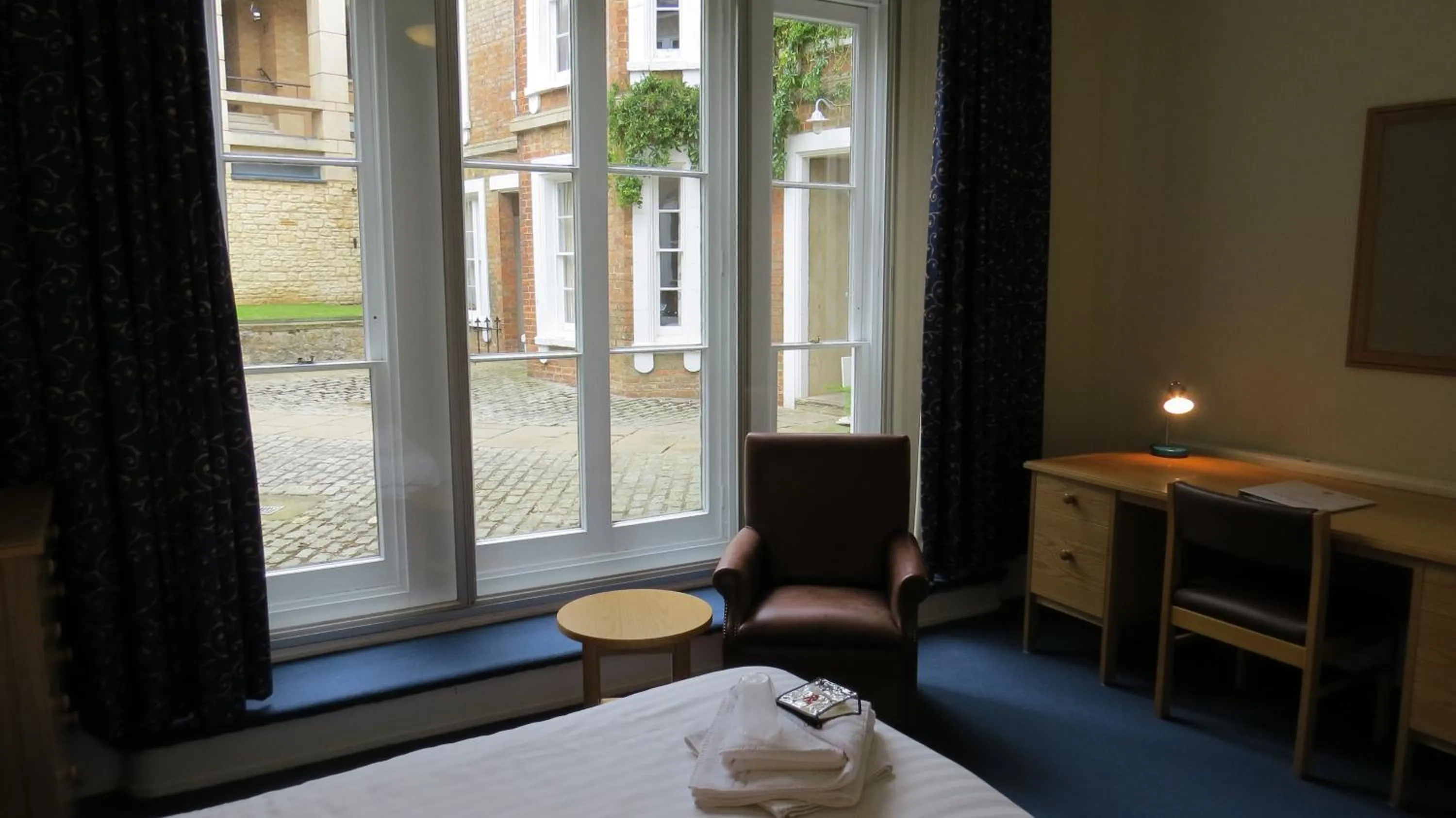 Photo of the whole room, Bed in Wadham College