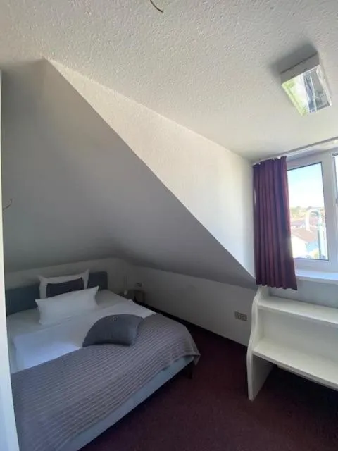 Photo of the whole room, Bed in Stadthotel Geis