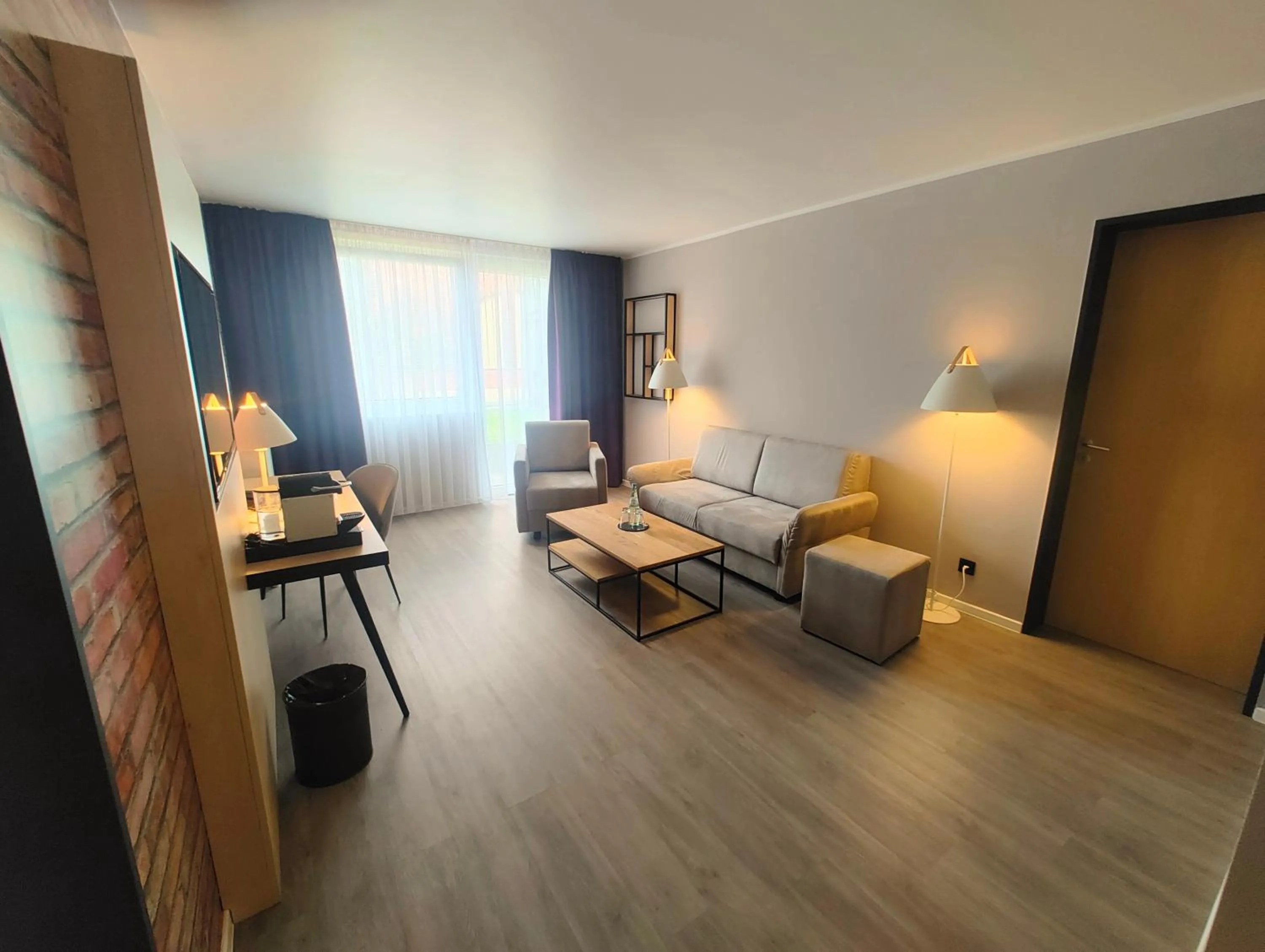 Living room in Offenbach Plaza Hotel