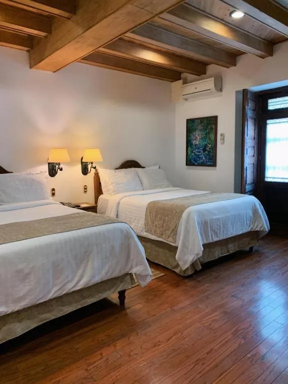 Bed in HOTEL MI SOLAR EJECUTIVO