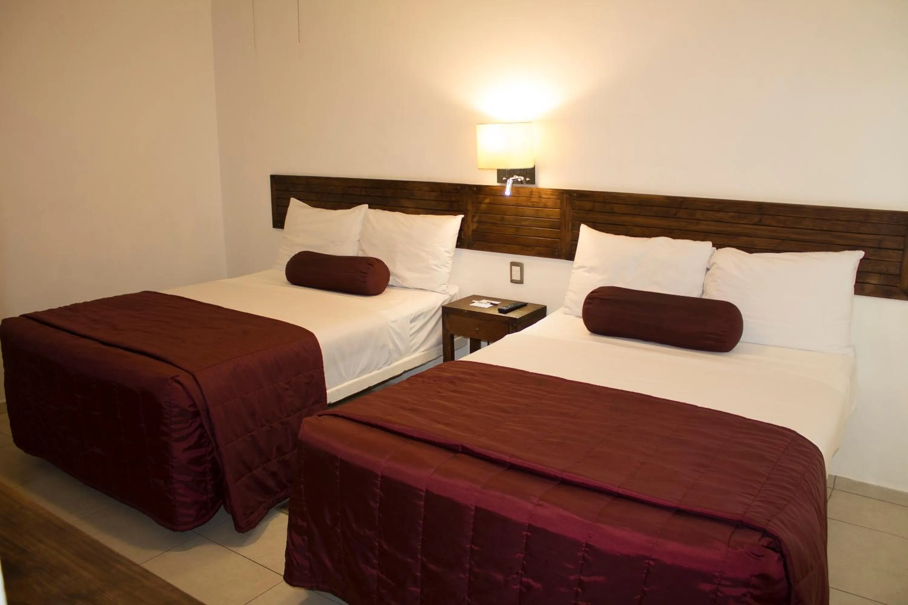 Bed in HOTEL MI SOLAR EJECUTIVO